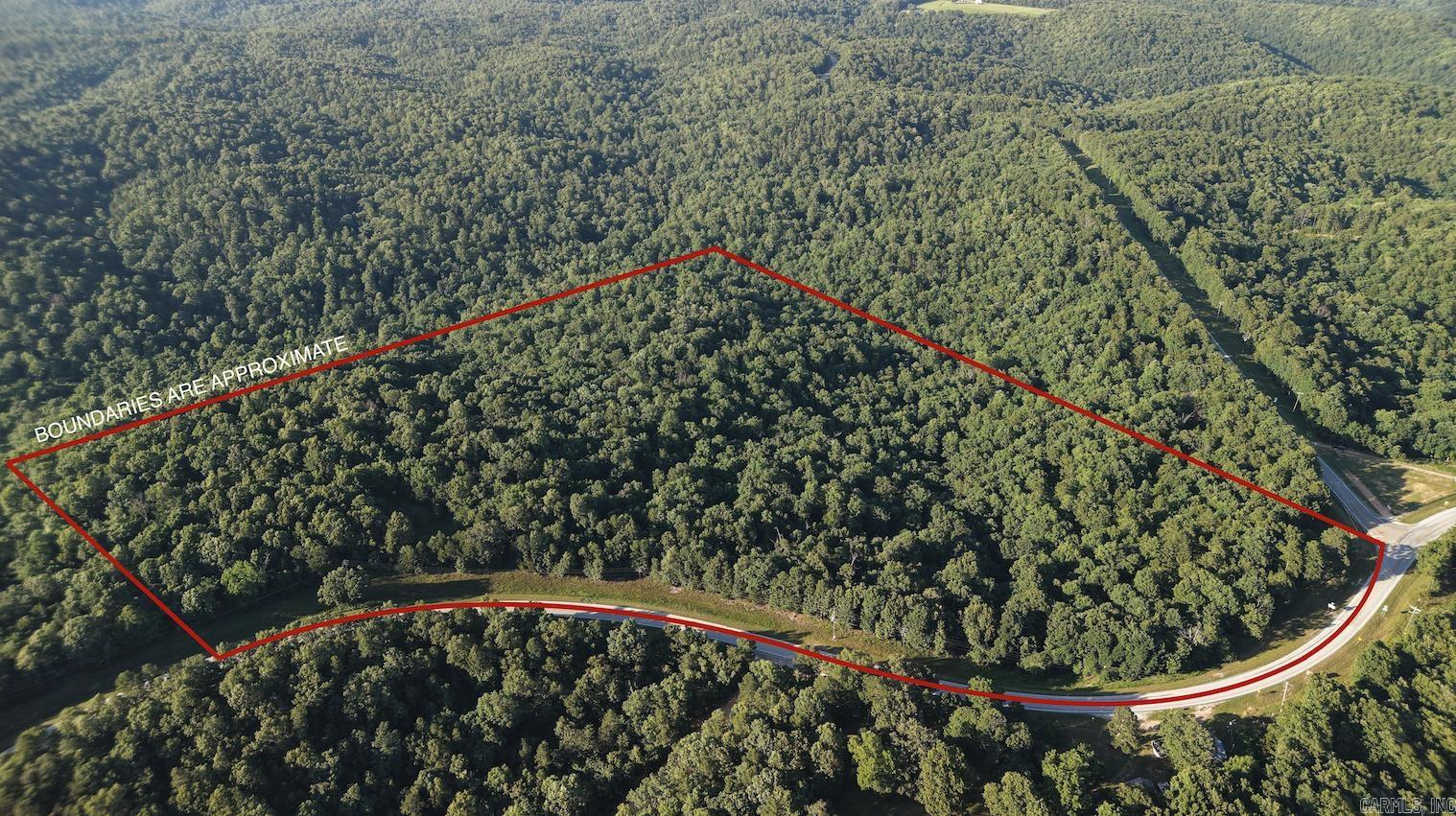 Discover the perfect blend of privacy, beauty, and opportunity with this stunning 31-acre tract nestled in the breathtaking Ozark Mountains. Covered in mature hardwoods and native timber, this property offers rolling terrain, peaceful surroundings, and abundant wildlife—ideal for hunting, recreation, or creating your private retreat. With multiple potential building sites, you can design your dream cabin, country home, or weekend getaway surrounded by nature. Electric nearby (verify), and plenty of room for trails, food plots, or a hobby farm. Whether you’re looking to escape the city, invest in land, or enjoy the outdoor lifestyle the Ozarks are known for, this acreage checks all the boxes. Minutes from area rivers and lakes yet tucked away enough to enjoy true seclusion. Don’t miss this rare opportunity to own a sizeable, wooded tract in one of the most desirable areas of the Ozarks!