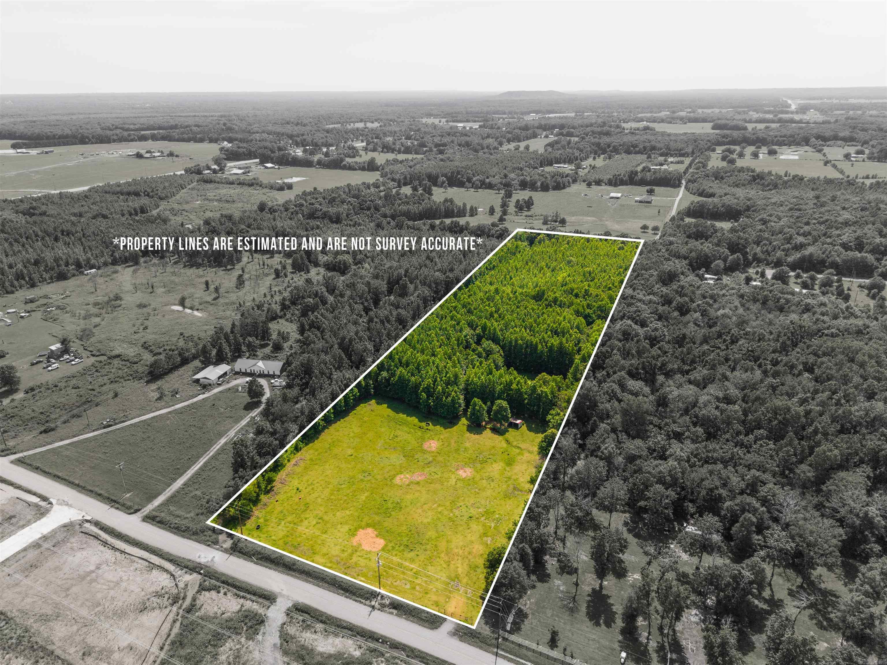 Beautiful 10  acres offering a mix of partially cleared land and mature woods, providing both open space and privacy. Ideal for building your dream home, recreational use, or future investment. Utilities are available at the road, making development more convenient. The wooded acreage offers natural beauty, abundant wildlife, and plenty of room to explore. Located in a peaceful rural setting while still within reasonable driving distance to town amenities.  Buyer to verify utilities, restrictions, and acreage.  *Property lines in photos do NOT represent accurate property lines, only for visual layout.
