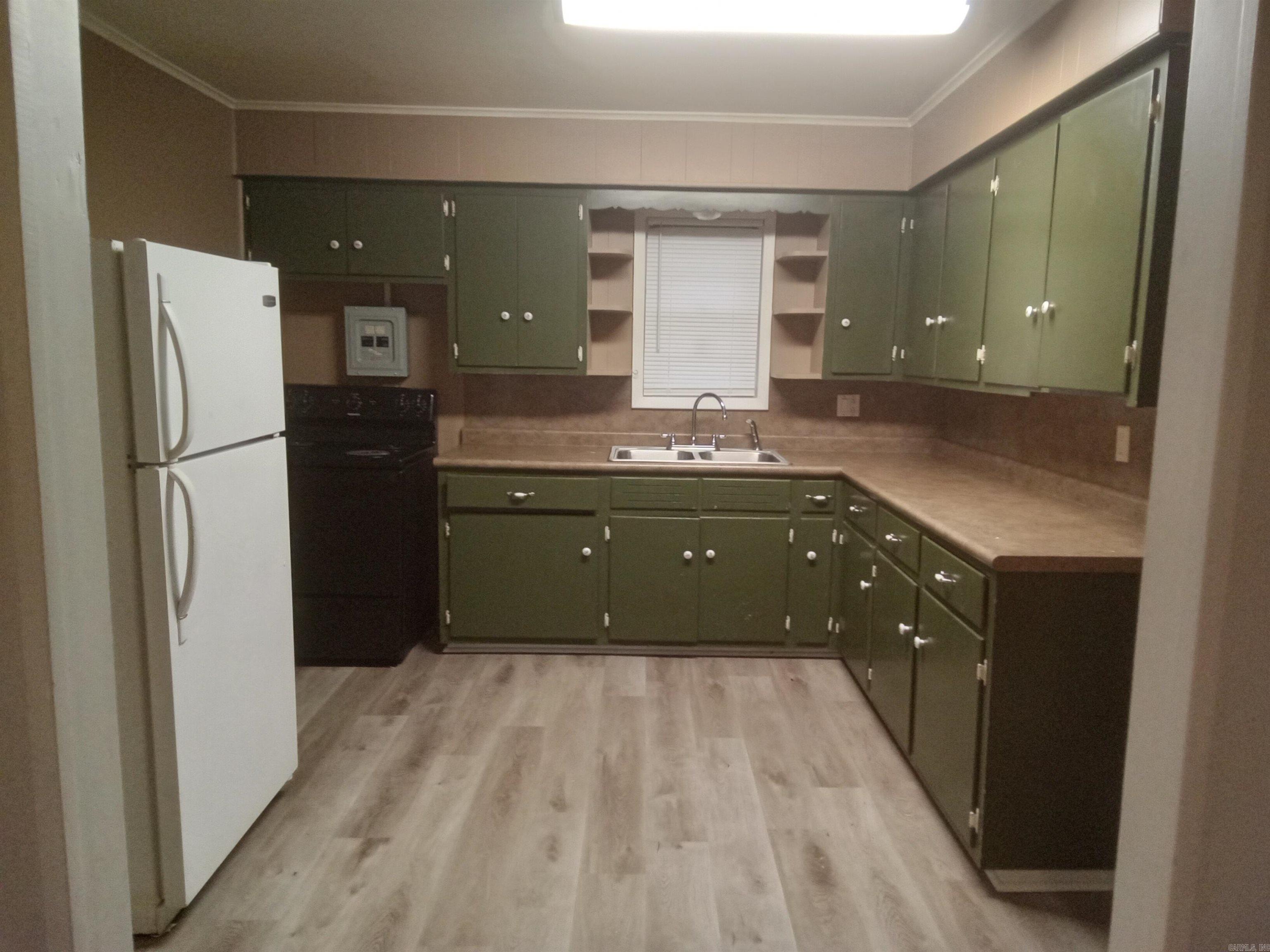 Spacious 3 bedroom, 2 bath home with a large yard. There is a storage building on the property as well as a covered carport for anything that needs stored outside.  Home is located outside of the city but a quick commute to Watson Chapel School, restaurants, stores and access to I-530