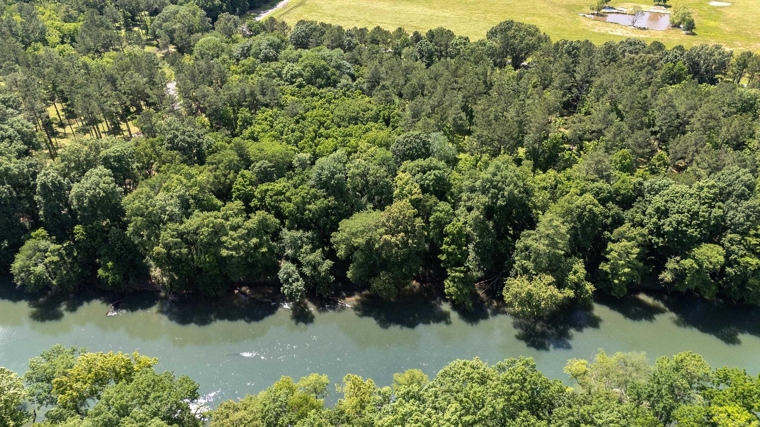 mazing lot with breathtaking views of the River. Lot has been perked and ready for your new home. 3 acre lot with approximately 234 feet of river frontage. Located in River Creek Estates Subdivision. No mobiles, minimum sf is 1200. Call me today for move information.