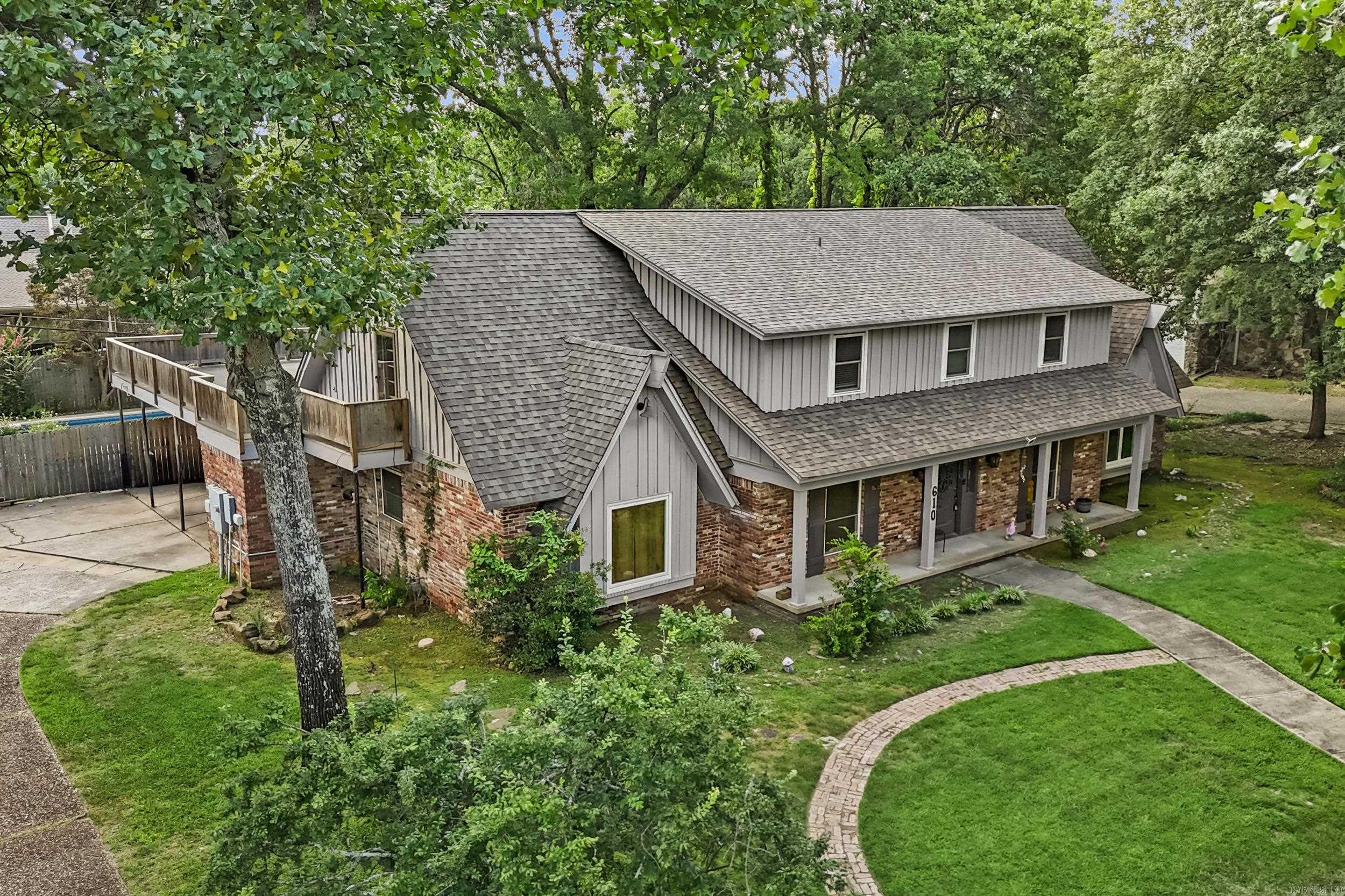 Welcome to this exceptional 5-bedroom, 3.5-bath home nestled on nearly a half-acre in the highly sought-after Shady Valley neighborhood. Surrounded by mature trees and known for its peaceful setting, this property offers the perfect combination of privacy, space, and timeless appeal. Inside, you'll find an expansive floor plan featuring formal living and dining rooms, a beautifully remodeled kitchen with quartz countertops, a spacious den/family room, a large office, and tastefully updated bathrooms throughout. The oversized primary suite is conveniently located on the main level and provides a true retreat with generous space to unwind. Step outside to your own private backyard oasis featuring an inground pool, outdoor storage, and a spacious entertaining area above the carport that's perfect for outdoor dining, relaxing, and hosting family and friends. With abundant living space, exceptional outdoor amenities, and a premier Shady Valley location, this is a rare opportunity to own a home that truly offers room to live, work, entertain, and enjoy.