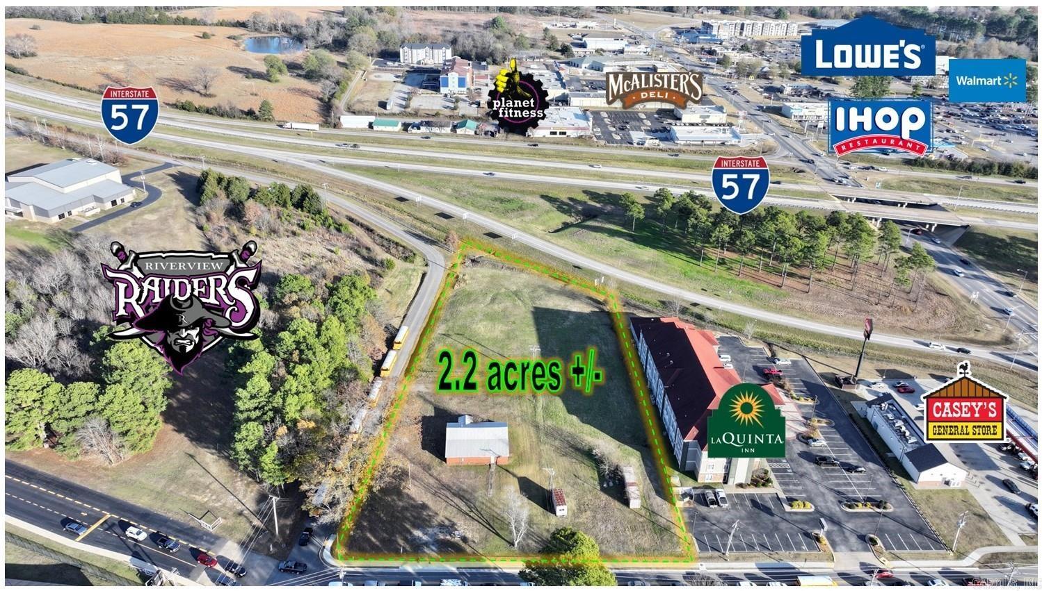 Prime Development Opportunity: 2.2 +/- Acre Corner Lot. A standout investment opportunity in the heart of Searcy’s expanding landscape. This expansive 2.2-acre corner lot offers the perfect blend of high visibility and strategic positioning, making it an ideal for your next project.Key Situated directly across from Riverview High School, ensuring constant foot traffic and high daily visibility. Unmatched Accessibility: Enjoy the convenience of close proximity and effortless access to Interstate 57, connecting you easily to the region's major hubs. As Searcy continues to experience steady growth, this sizable corner tract is perfectly positioned to capitalize on rising demand. With approximately 2.2 acres of level ground, the possibilities range endless!