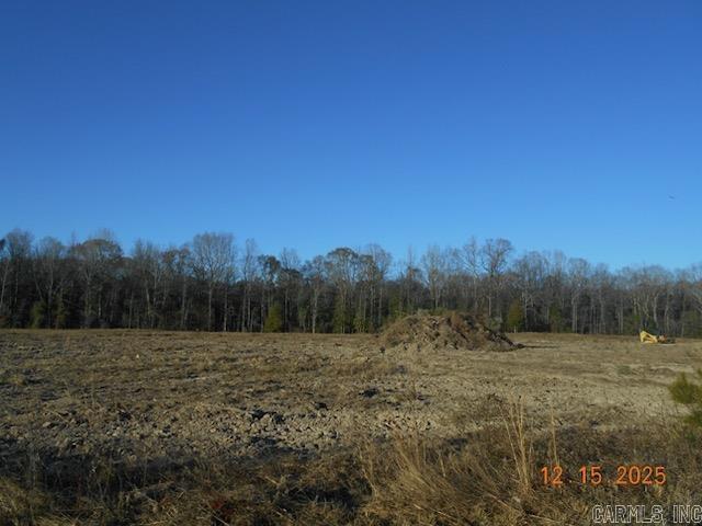 Property narrow but deep in layout. Wet weather creek toward back. Front half has been grubbed and ready for a house. Has been prelim perked (letter in documents) Restricted to houses with mininum square footage of 1000 sf. (deed restrictions in documents) Sardis Water available at road, Electricity at road, Windstream/Go Kinetic fiber internet and gas is to the east and might be able to be extended....would need to contact Summit Utilities.