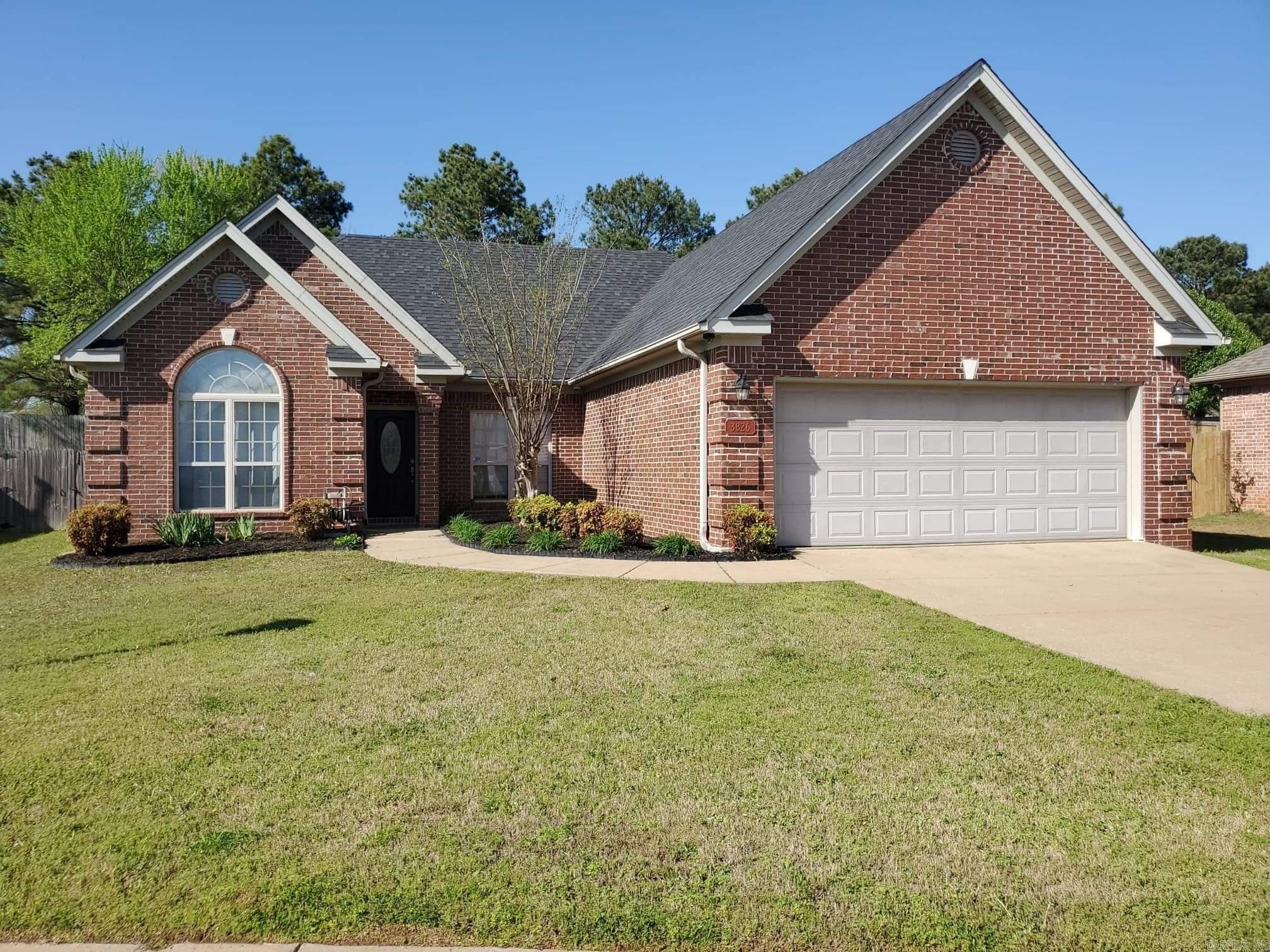Split floor plan, 3 bedroom, 2 bath home! The kitchen has lots of cabinet space & stainless steel appliances.  The living room has a tray ceiling, crown molding, and gas log fireplace. Master bedroom has tray ceiling. The master bath has his and her closets, double sinks, and jetted tub. Lots of closet space. The backyard is large and private with a covered patio. A new roof was installed in 2016. New HVAC installed in 2021.