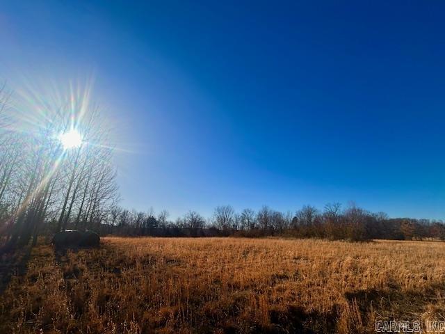 200 acres m/l of prime recreational land featuring hay fields, a pond, mature hardwood trees, and beautiful mountain views. Excellent hunting and outdoor recreation with abundant wildlife. Located near the White River and Mountain View, AR ( The Folk Music Capital of the World). No utilities currently on site; well needed and power is possible. Ideal for a hunting cabin, weekend retreat, or off-grid homestead with room for gardens and farming. Property already has ATV trails. Showing by appointment only. Get your appointment scheduled today!