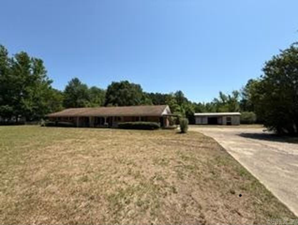 3 bedroom 2.5 bath, 1904 Sq ft.  Lot is .42 acres.