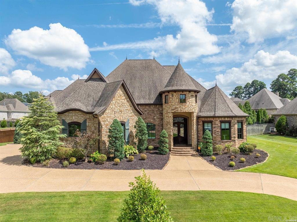 Welcome to luxury living in the sought-after Arlington Park subdivision! This stunning 4 bedroom, 5 bath home offers  4,462 sq ft of beautifully designed and family-friendly spaces. Step inside and you will immediately notice the gorgeous hardwood flooring and vaulted ceilings that create a bright welcoming feel. Take notice of the beautifully appointed formal dining area that opens up to the spacious living room, kitchen, and breakfast area. A gourmet kitchen that flows seamlessly into the spacious living area. Featuring a stainless steel refrigerator, 5 burner gas stove, and not one but two ovens, this kitchen is truly a culinary dream. The large granite topped island not only provides ample prep space but also holds an ice maker and dishwasher for added convenience. There is a large home office, perfect for the remote worker or entrepreneur seeking a private work oasis. Multiple storage closets and even more storage under the stairs. The master suite is apart from the other bedrooms offering a true retreat. The ensuite features a spa-like atmosphere and ample WIC closet space, jetted soaking tub and walk in shower. Continued in agent remarks...