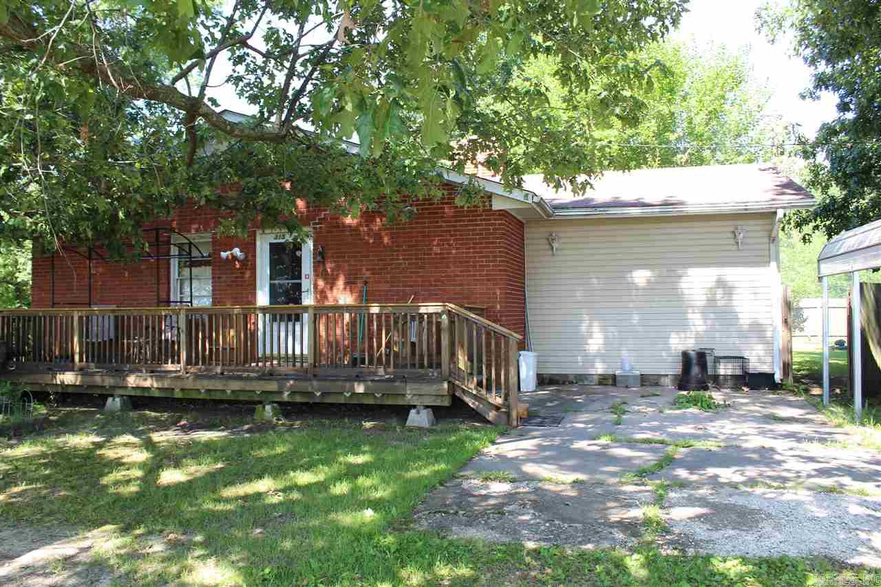 **Owner Financing Available!**This charming home has 3 bedrooms, 2 baths, a den, breakfast bar, great built-ins in one of the bedrooms, sits on 2 lots on a dead-end road. Yard behind home has a privacy fence, 2 carports, and a building that was an in-law suite that could be fixed up to use as a rental or a mancave. 2 refrigerators, washer & dryer, sauna, flooring allowance for den floor to be replaced, zero turn mower & push mower to stay with property with an acceptable offer. Call today for your tour!