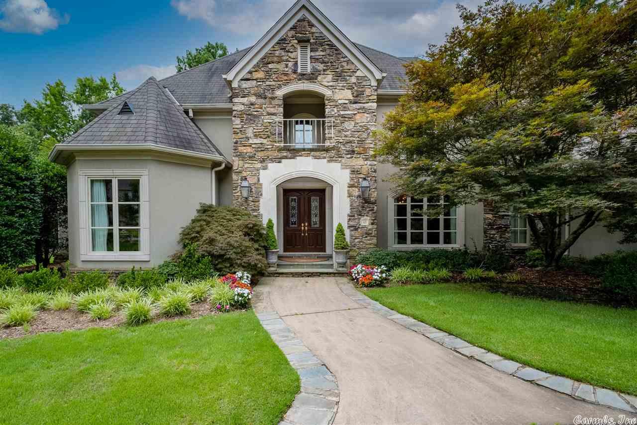 Spectacular Chenal Valley Golf Course home!  Beautiful condition inside and out.  Outstanding family floor plan with exceptional golf course views.  Wonderful foyer with open staircase.  Elegant master suite on main level with workout room.  Handsome study or library on main floor.  Large formal living with two story ceiling.  Gourmet kitchen, quality appliances and large island opens to family room.  3 Bedrm suites up and Entertainment/THEATER room.  Amazing backyard with water feature and covered terrace.