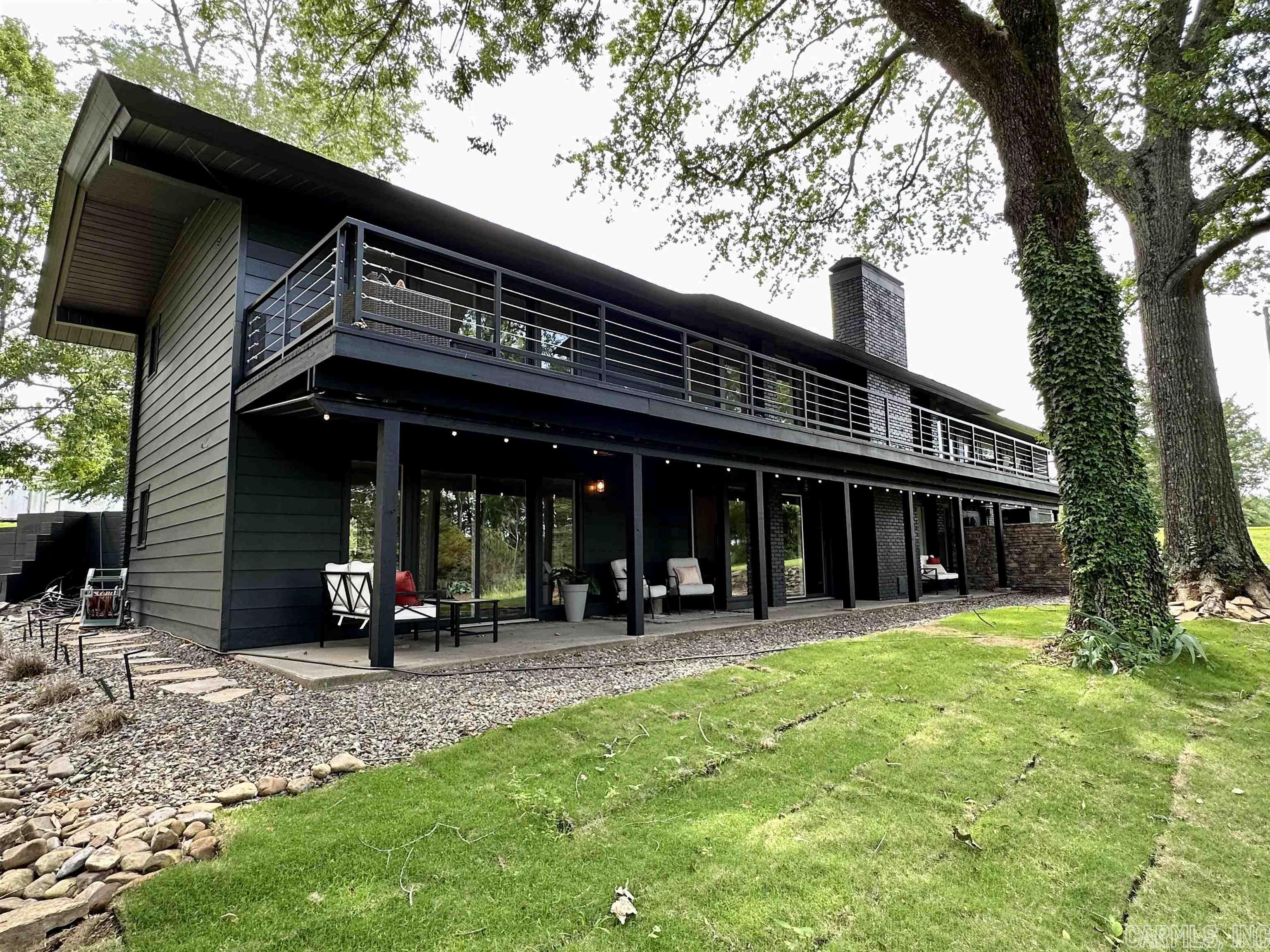 Breathtaking Greers Ferry Lakefront home remodeled from top to bottom. New architectural shingles, HVAC, water heater, flooring & paint inside & out. Kitchen features new cabinets, counters, Kitchenaid appliances, wine refrig, icemaker & Island w/seating. 2 master bedrooms, 2 living rooms w/fireplaces, 4th builtin sleeping area. The home can be purchased completely furnished  $1,050,000.00. The location of this captivating home can not be beat, walk to Sandy Beach for all the summer activities, minutes from downtown Heber Springs shopping & dining, quiet, tucked away, upscale established neighborhood. Excellent vacation rental potential too! See Documents & Agent Remarks for more information.