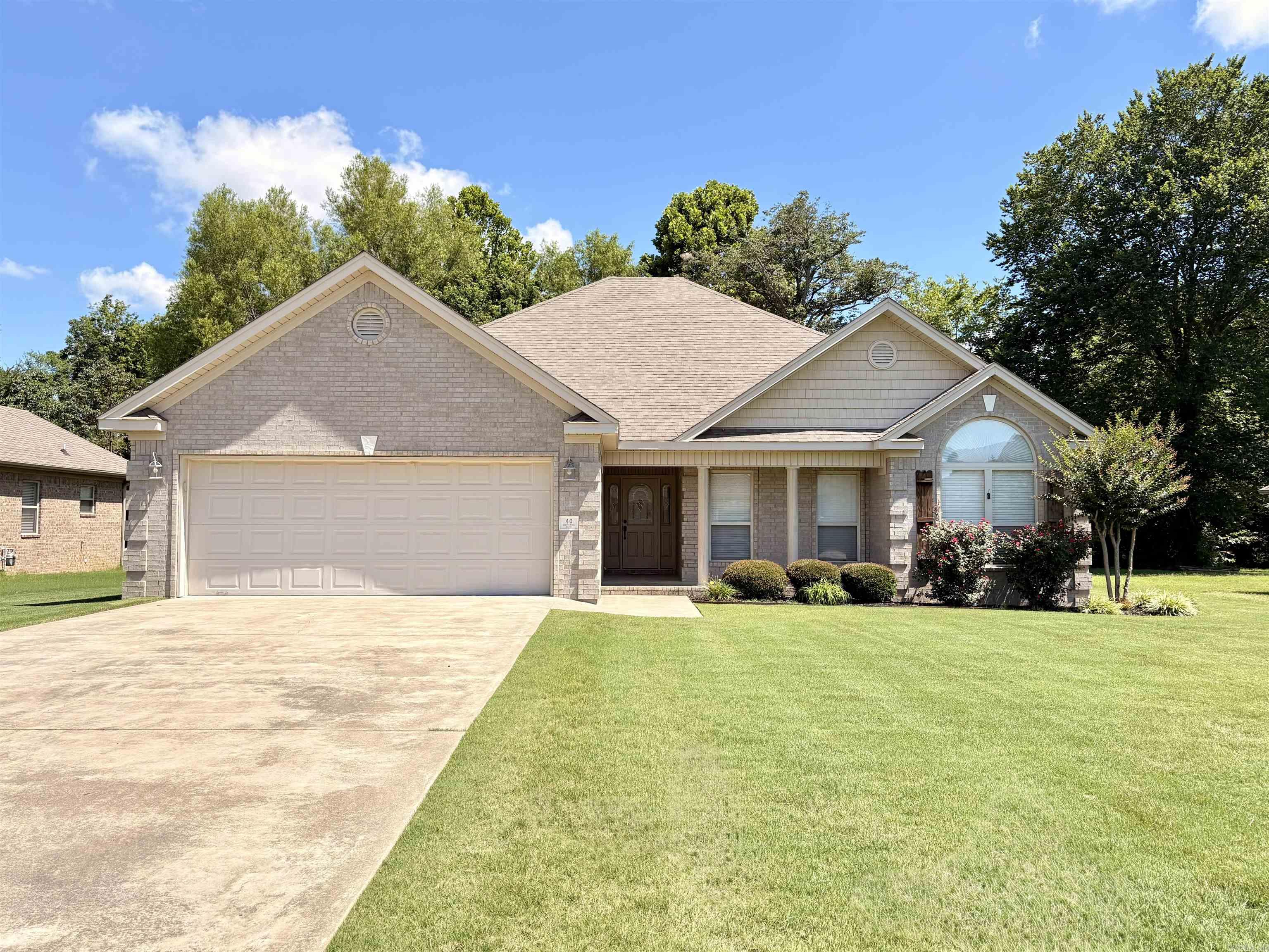 Charming corner-lot home in Southwind Estates — move-in ready and full of curb appeal and beautiful vaulted ceilings. Spacious living areas have hardwood floors, a fireplace and updated bathrooms. The master bedroom includes extra space ideal for a home office or nursery.  3 bedrooms, 2 baths, private backyard with a fire pit — perfect for entertaining and located on a cul-de-sac. The neighborhood pool is conveniently located across the street. This home is waiting for the next family to enjoy a quiet neighborhood with memories to be made. Ample storage and generous closets make this a comfortable fit for any stage of life. Sellers are offering a $4000 allowance to new buyers to add their own personal touches.They are also leaving an adorable bed perfect for children or guests. A new hot water heater is being installed.  Ready to welcome your family — schedule a showing and let us open the door to your new home.