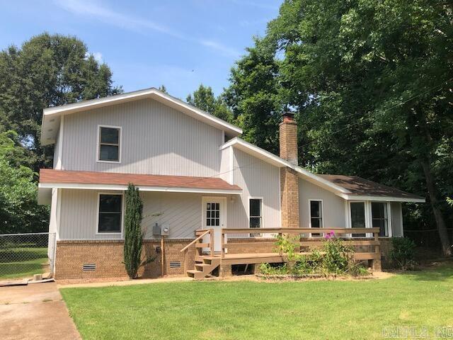 All the summer fun with room for everyone! Sitting in 1 acre, this 2 story house has two bedrooms and a full bath on the main floor, and a 3rd bedroom and half bath upstairs. There's plenty of space to add a shop or to have a pool. Completely chain-link fenced yard with several mature trees, and an outbuilding in backyard for storing. Right next to Pfeiffer creek and behind the Shooting Complex. Conveniently located between Batesville and Cave city.