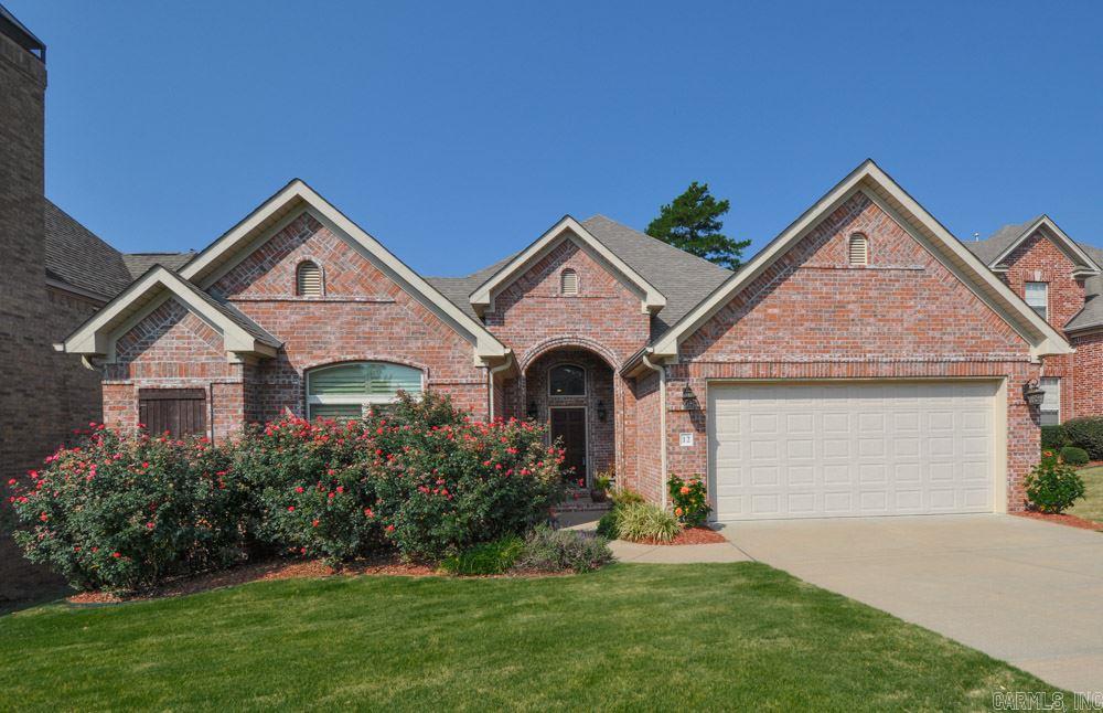New Listing and has just about everything you are looking for!!  This elegant home offers custom hand-scraped wood floors through out living area, beautiful slate floors in bathrooms, carpet in bedro.  Custom wood cabinets in kitchen with slab granite countertops!  Kitchen offers a chef's dream gas cook top, with oven and microwave all stainless steel open to the living area.  Nice huge master suite w/ trey ceiling. Theatre/gameroom upstairs. Huge unfinished basement>> AGENTS SEE CONFIDENTIAL REMARKS!