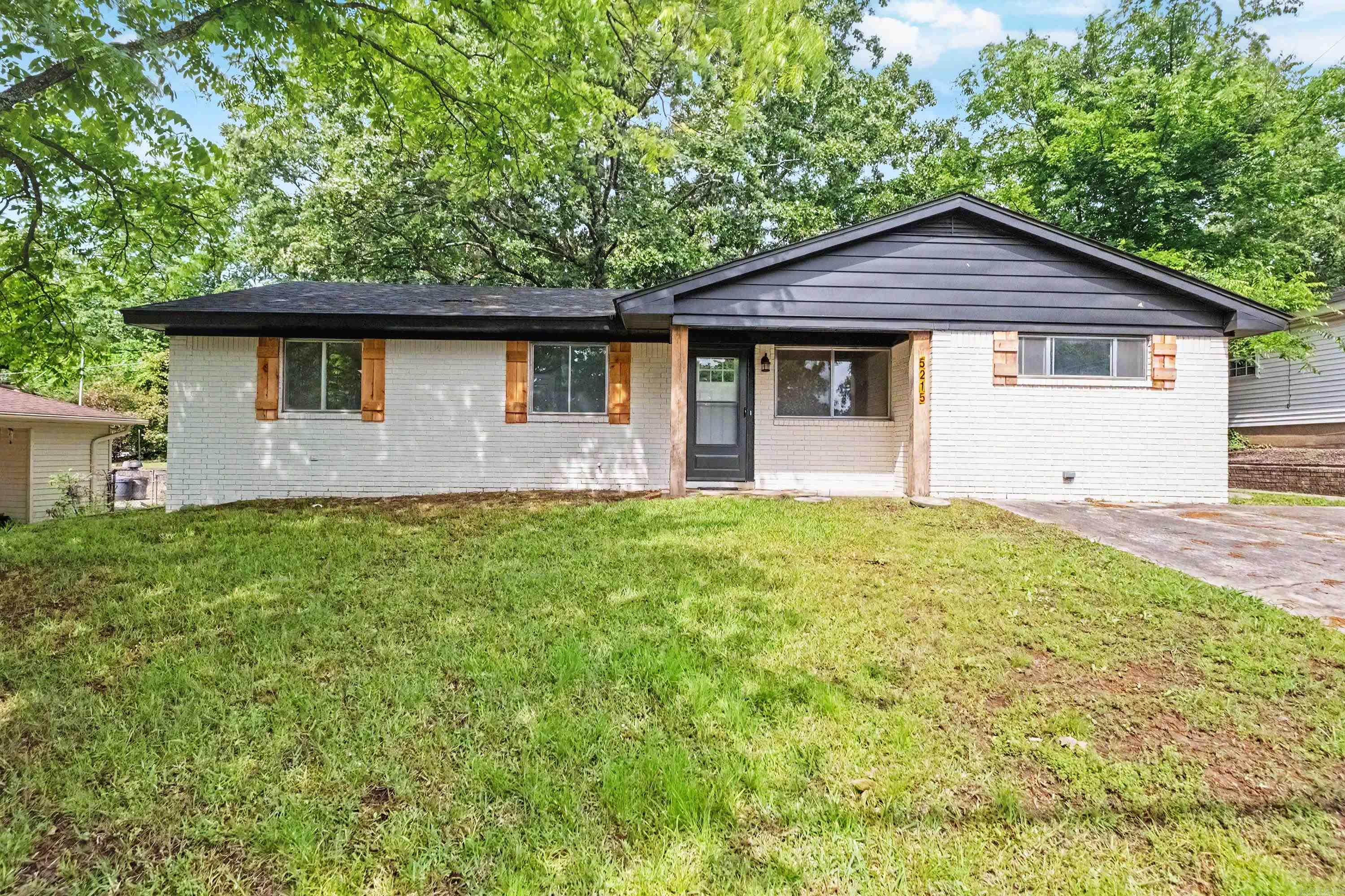 Beautifully remodeled 3-bedroom, 1-bath home located in the heart of North Little Rock! This move-in ready property features brand-new flooring, fresh paint throughout, updated cabinetry, and stainless steel appliances. Enjoy cozy evenings by the fireplace and take advantage of the bonus room/second living area — perfect for a home office, playroom, or additional entertaining space. Additional updates include a brand-new water heater,  Roof and HVAC for added peace of mind. Outside, you’ll find a large storage shed/workshop offering plenty of extra space for tools, hobbies, or storage needs. Whether you’re a first-time homebuyer or simply looking for a beautifully updated home with extra space, this property is a must-see!