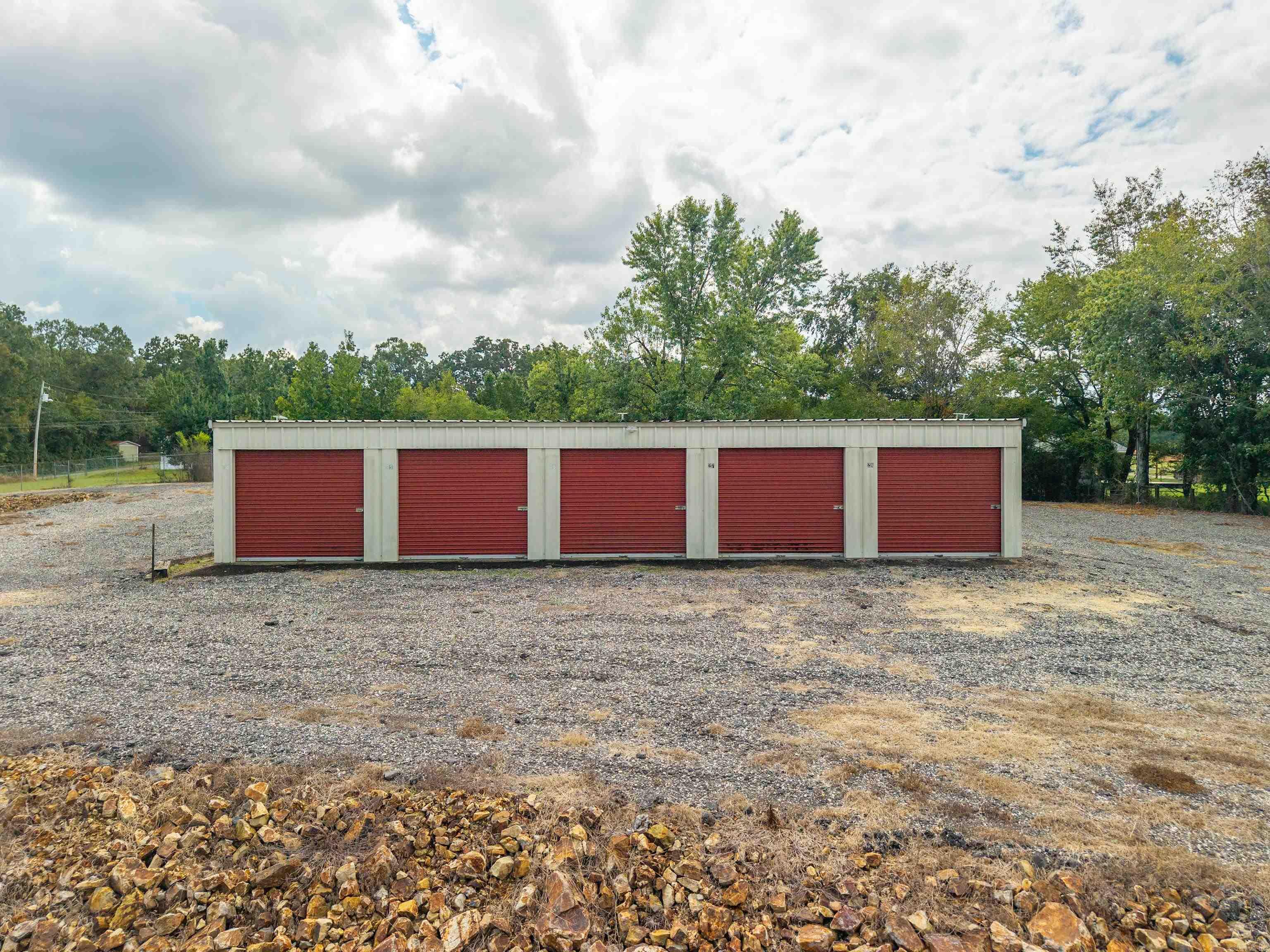 Investment Opportunity – 28-Unit Mini Storage in Magnet Cove located on 2.18 acres MOL. Secure your next income-producing property with this 28-unit mini storage facility, conveniently located in the growing Magnet Cove area of Arkansas. This property offers potential of consistent rental income with a strong demand for storage in and around the community.  Featuring easy access, durable construction, and a mix of unit sizes, it’s a turnkey investment for both seasoned and first-time investors. Low-maintenance operation and the potential of creating a steady cash flow make this an excellent addition to your portfolio.