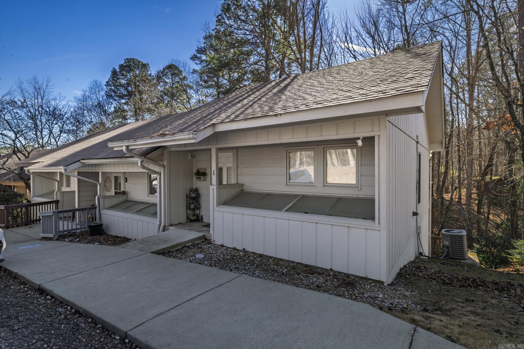 Very nice end unit. No popcorn ceilings and no carpet. Updated kitchen and stainless steel appliances. Refrigerator conveys with home. Entry level kitchen, large living/dinig area, half bath and deck. Lower level has 2 bedrooms and Jack n Jill bath with walk in shower. Laundry closet and lower deck. Architectural shingles are one year old. Seller Property Disclosure is not available. Home is being sold as is. Seller will not make any repairs. Agents-See Remarks