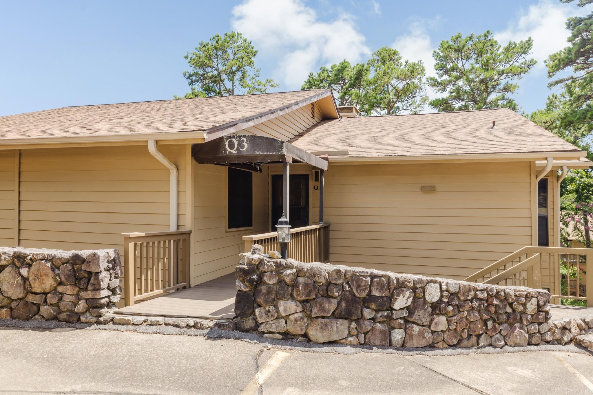 This Cond on the Lake is a 3-bedroom, 2-bath entry-level condo offers the perfect blend of comfort, convenience, and lakeside living in a secure gated community on Lake Hamilton. Enjoy stunning lake views from the private patio, where you can relax with your morning coffee or unwind at sunset. The spacious open-concept living and dining area is filled with natural light, creating a warm and inviting atmosphere for everyday living or entertaining. The well-appointed kitchen features ample cabinetry and workspace, while the generous primary suite includes a private bath and plenty of closet space. Two additional bedrooms provide flexibility for guests, family, or a home office. As an entry-level unit, you'll appreciate easy access with no stairs to climb. A dedicated boat slip is included, making it simple to spend your days cruising, fishing, or enjoying water sports on beautiful Lake Hamilton. Community amenities, gated security, and a prime waterfront location make this condo an ideal full-time residence, weekend getaway, or investment opportunity.