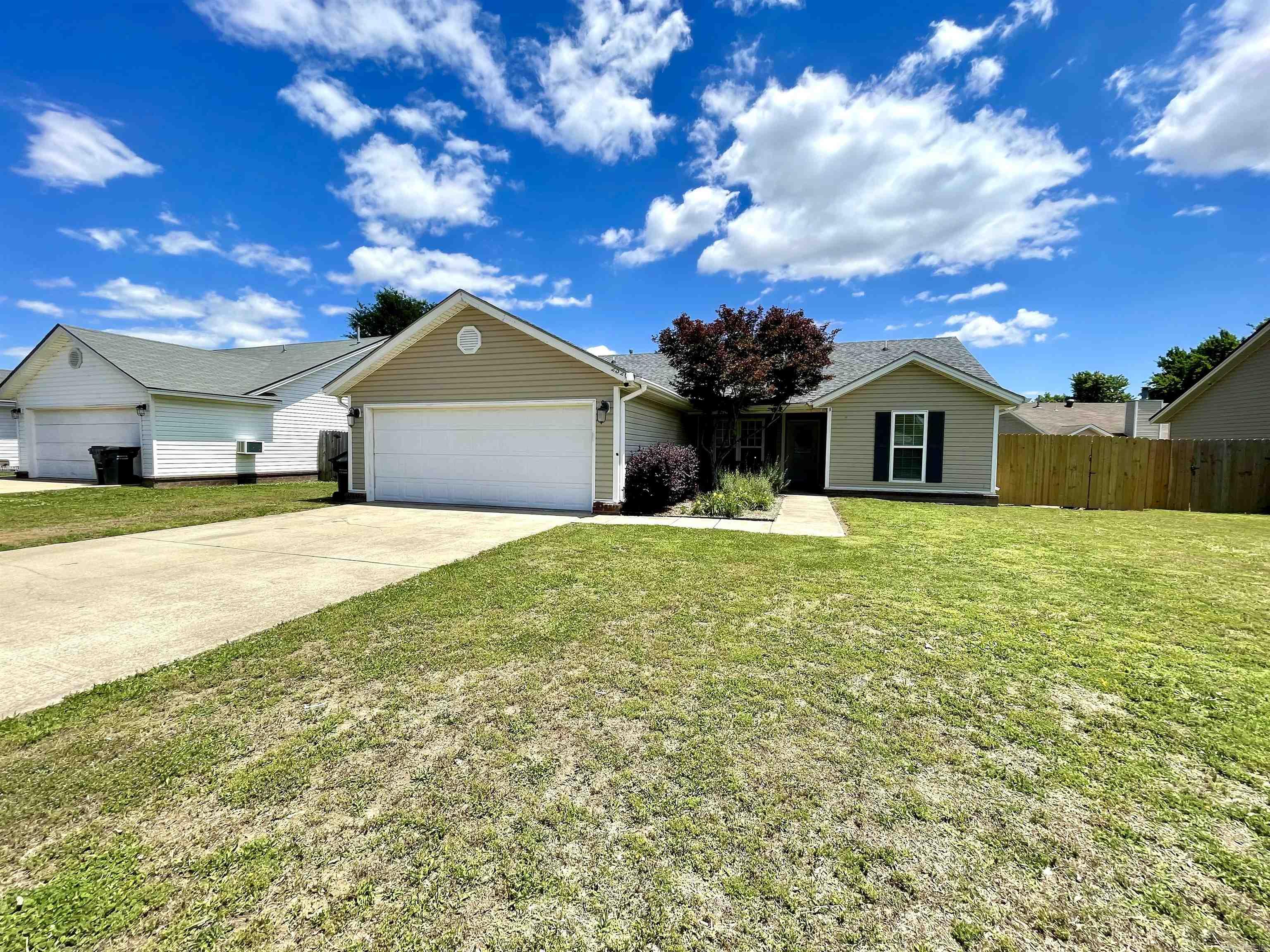 Come home to 2520 Britton Dr. in Jonesboro, Arkansas! Located in Brookland school district and on Jonesboro CWL utilities, it is affordable and low maintenance. The central heat and water heater are natural gas. This home offers 3 bedrooms, 2 baths, a 2 car garage, gas log fireplace in the living room, updated flooring in the living areas, and a fenced backyard. A new roof was installed last year. You'll love the location and all the extra storage. There is a separate laundry room, a true kitchen pantry, and linen closets in both bathrooms. Call your favorite REALTOR® and schedule your private tour!