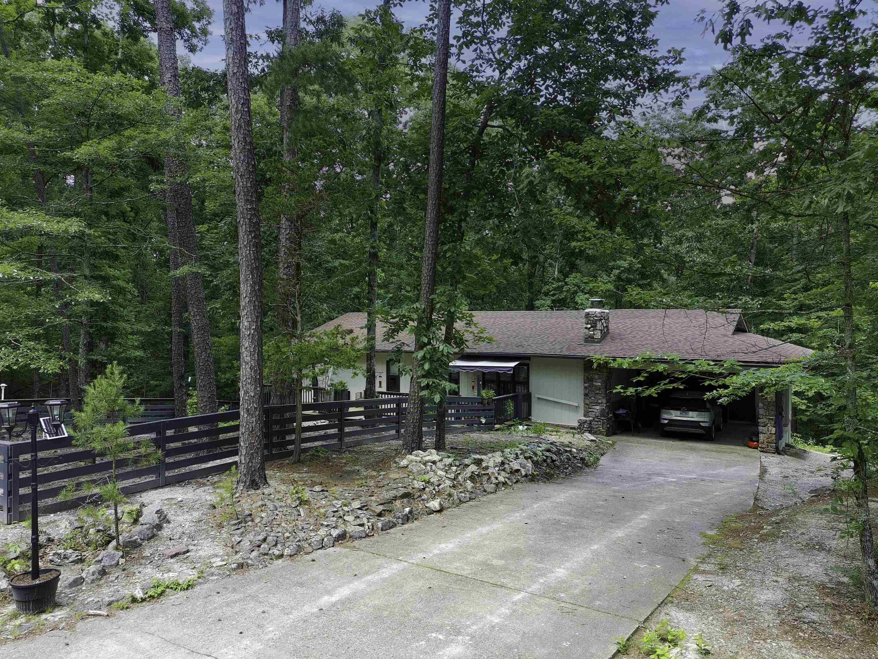 Extensively updated home on ~5 acres, offering the perfect blend of modern upgrades and rustic charm. The completely remodeled kitchen serves as the centerpiece of the home with custom cabinetry, butcher block countertops, a large center island, stainless steel appliances, walk-in pantry, coffee bar, and abundant storage. The open-concept living area features vaulted ceilings, luxury vinyl plank flooring, and a stunning floor-to-ceiling stone fireplace. Recent improvements include renovated bathrooms, a newly added third full bathroom and windows in the lower-level living area, a new main-floor laundry room, new HVAC system, new water heaters, EV Charging Outlet, new electrical panels, and a whole-house generator for added peace of mind. Main-Floor Laundry Room and another in Lower Living Area. Fiber Internet Available. The deck overlooks the serene, wooded setting, creating an ideal space while enjoying the privacy of the acreage. The adjoining property at 279 Needham Rd at ~4.25 +/- acres is also available for purchase under a separate listing 26021092, providing an opportunity to expand your acreage and privacy.