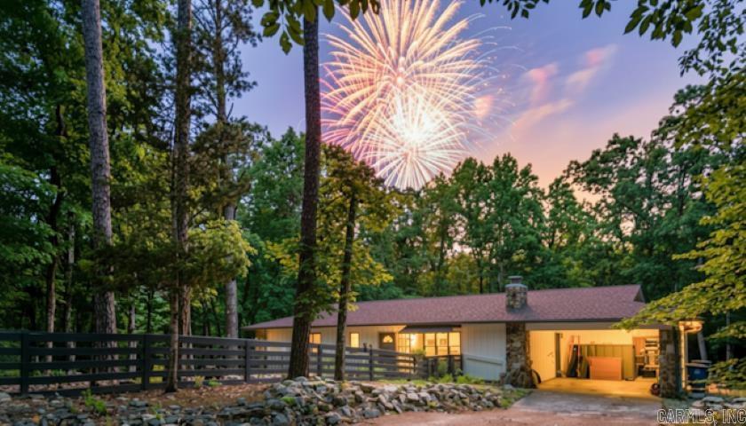 Extensively updated home on ~5 acres, offering the perfect blend of modern upgrades and rustic charm. The completely remodeled kitchen serves as the centerpiece of the home with custom cabinetry, butcher block countertops, a large center island, stainless steel appliances, walk-in pantry, coffee bar, and abundant storage. The open-concept living area features vaulted ceilings, luxury vinyl plank flooring, and a stunning floor-to-ceiling stone fireplace. Recent improvements include renovated bathrooms, a newly added third full bathroom and windows in the lower-level living area, a new main-floor laundry room, new HVAC system, new water heaters, EV Charging Outlet, new electrical panels, and a whole-house generator for added peace of mind. Main-Floor Laundry Room and another in Lower Living Area. Fiber Internet Available. The deck overlooks the serene, wooded setting, creating an ideal space while enjoying the privacy of the acreage. The adjoining property at 279 Needham Rd at ~4.25 +/- acres is also available for purchase under a separate listing 26021092, providing an opportunity to expand your acreage and privacy. Note: AI Generated Primary picture with fireworks.
