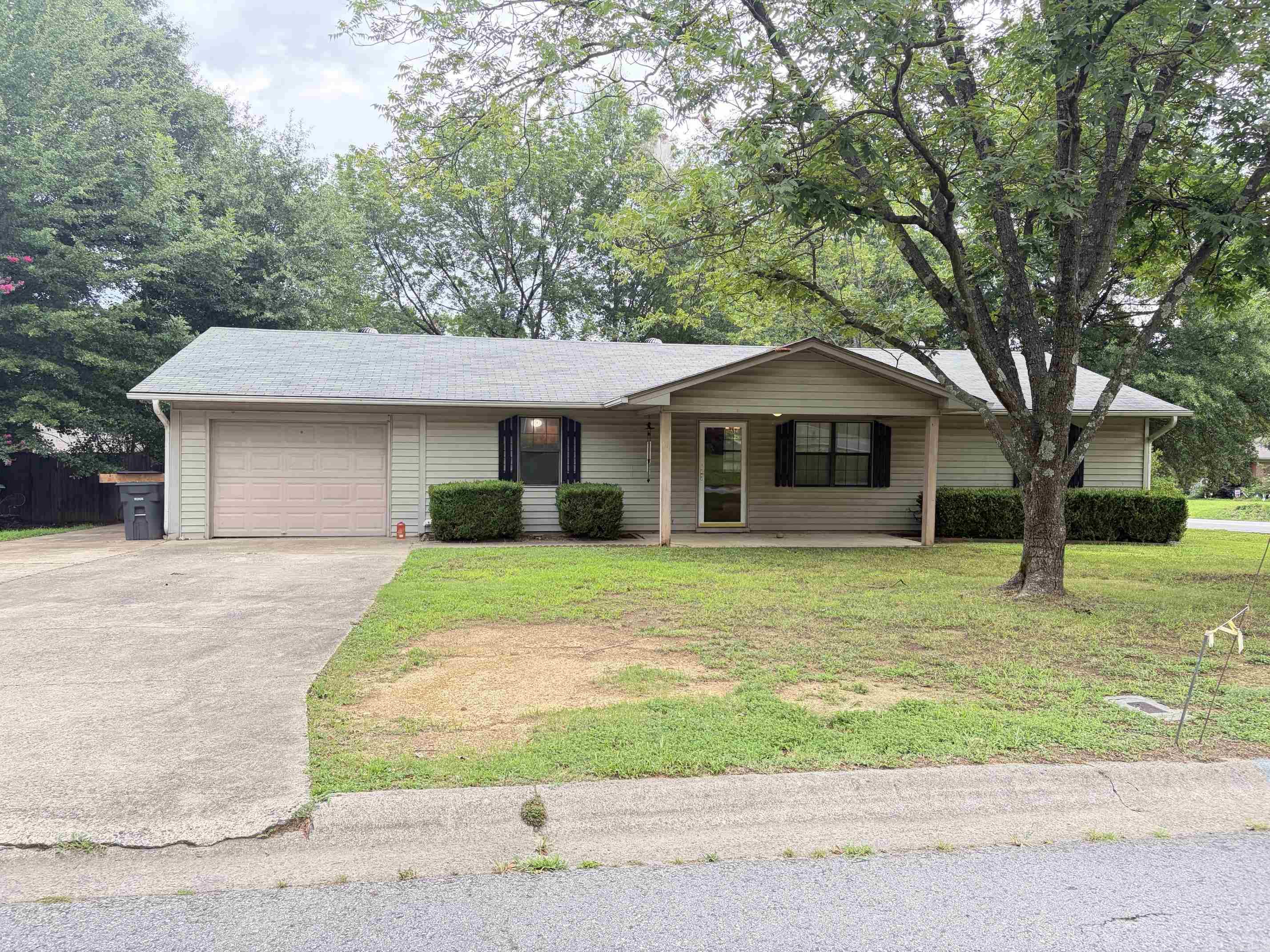 Located in a long-established city neighborhood, this 3-bedroom, 2-bath home offers 1,344 sq. ft. of living space on a desirable corner lot. Built in 1987, the home features a one-car garage and a covered, mostly enclosed back porch for added privacy. With great bones and original character, this property is priced to sell and offers a wonderful opportunity to update and make it your own.