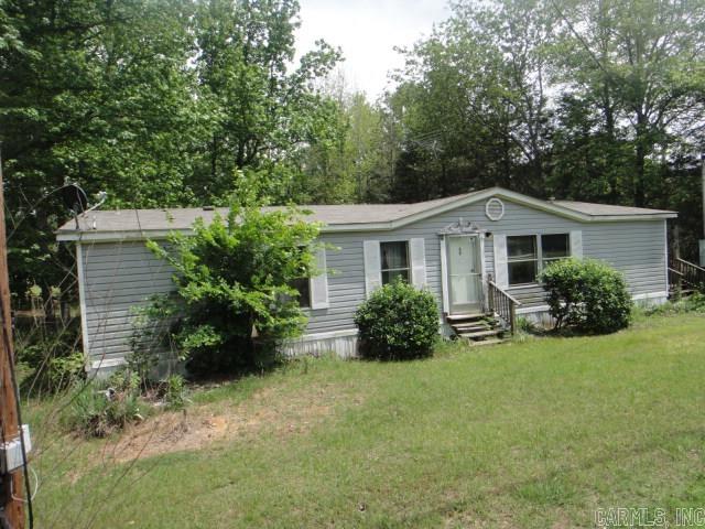 A little piece of country living. This 3BR 2BA mobile home has an open floor plan with a large breakfast bar. There is also a Laundry Rm. Primary BA has a garden tub.