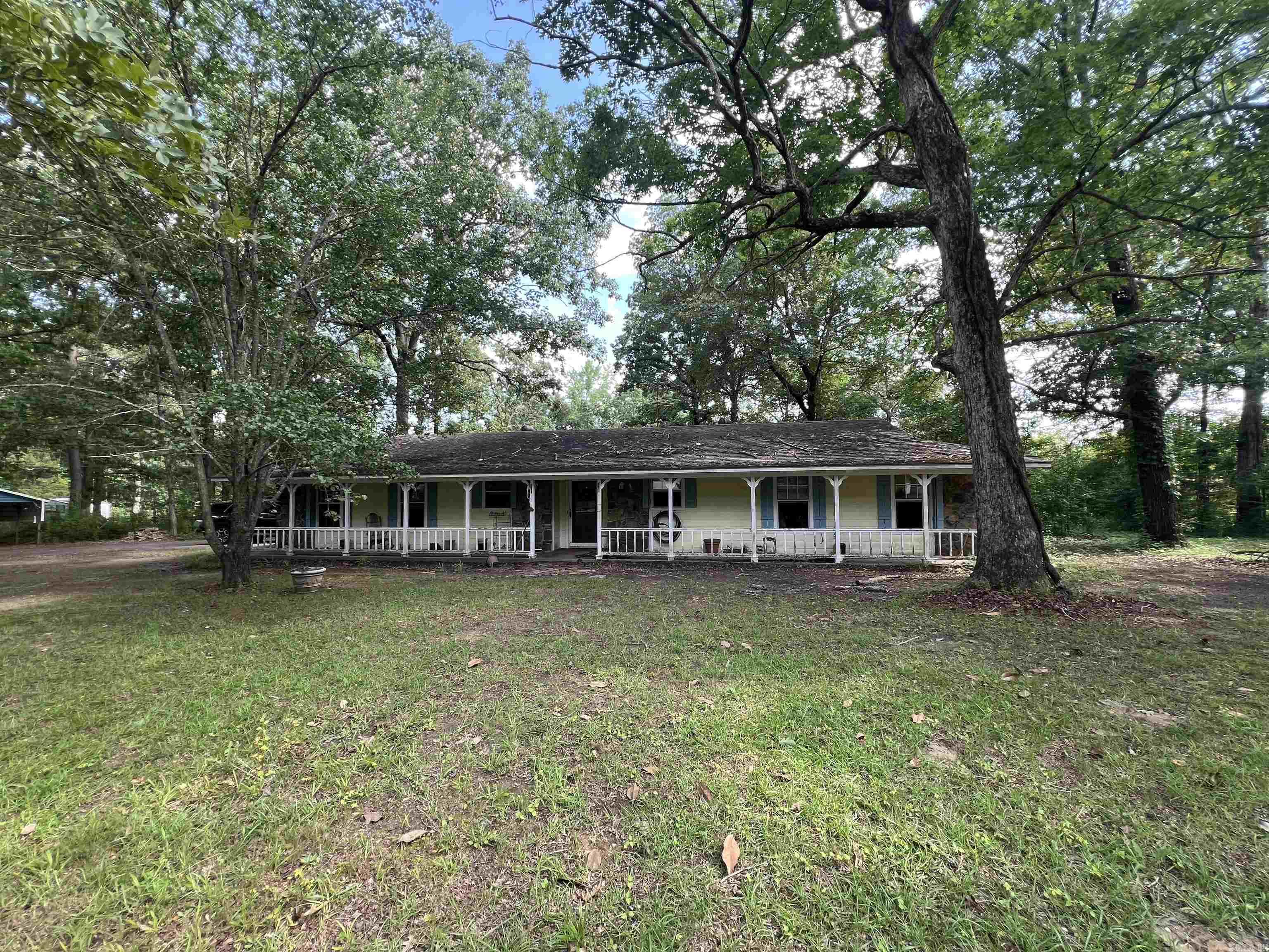 FIXER-UPPER ALERT !!! Over 1 Acre + Huge Shop! First time on the market! This 3-bed, 2-bath original-owner home is a blank canvas packed with profit potential. Sitting on a massive 1+ acre lot, the property features a detached shop and an extra storage building. Area comps top $250,000+, leaving plenty of room for sweat equity. Perfect for a quick flip or a high-yield rental. Bring all offers—this investor special will not last!