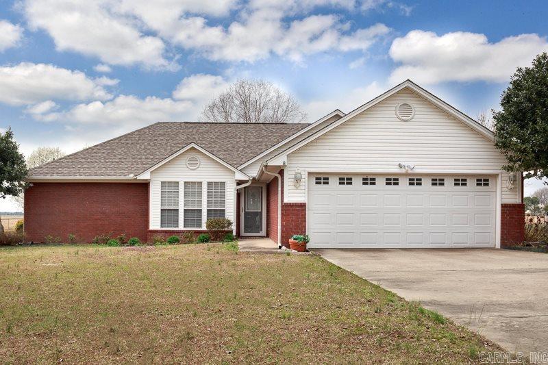 County feel, but close to shopping! Great home with 3 big bedrooms, and 2 full baths. Eat-in kitchen and separate dining room. Split floor plan. HUGE master suite has two sinks, jetted tub, walk-in closet! Kitchen has pantry and NEW stove, dishwasher, microwave in 2017. 20x24 SHOP with roll-up door and 220 power, with new extra concrete and walkway. STORM SHELTER with power! Watch the horses from your new covered back patio. No rear neighbors. New roof on home and shop in 2016. Playset is negotiable.