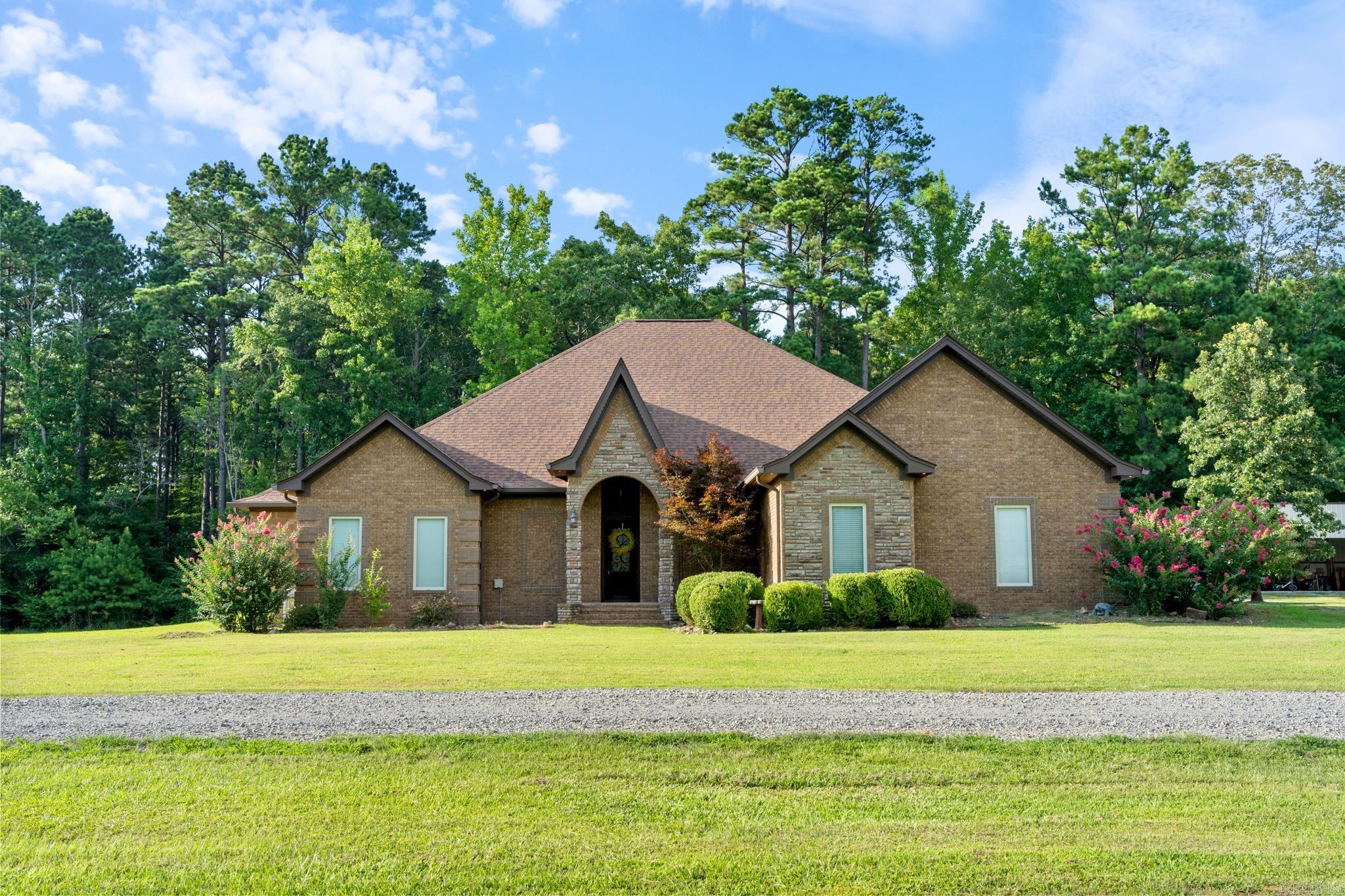 This home truly has it all! Nestled on 1.67 acres in Sheridan, this stunning 4-bedroom, 3.5-bath home offers 2,874 square feet of thoughtfully designed living space with incredible amenities both inside and out. Step outside to your own private retreat featuring an amazing outdoor living area complete with an outdoor kitchen, a one-of-a-kind custom quartz ping pong table, and a fenced inground pool with a slide—perfect for entertaining family and friends all summer long. This property is packed with extras, including an on-demand whole-home generator, a detached brick carport, a huge shop, an additional four-bay toy shed for boats, ATVs, or recreational vehicles, a safe room, and a dedicated craft room in the garage. Need space for guests or multi-generational living? The detached 464-square-foot mother-in-law quarters overlooking the pool includes a private bedroom and full bathroom, providing the perfect setup for visitors, extended family, or a home office. With room to spread out, exceptional outdoor amenities, and endless storage for all your hobbies and toys, this one-of-a-kind property offers the lifestyle you've been searching for. Schedule your showing today