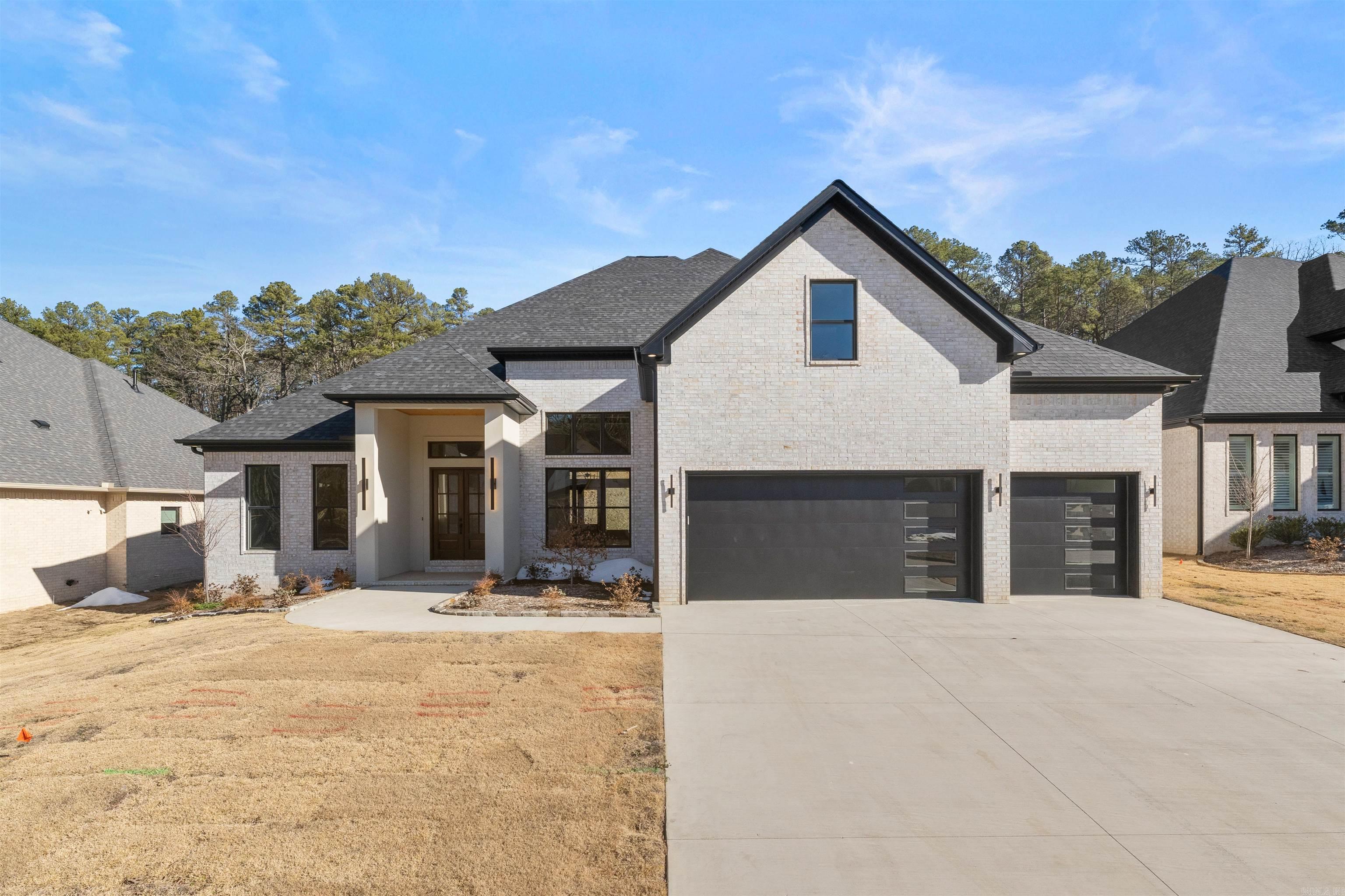 **Elegant New Construction in Chenal Valley!**  Stunning 5BR/4.5BA home in Abington Court with 4,488 SF of luxury living. Features 14' ceilings, open floor plan, quartz countertops, walk-in pantry with cabinets & counters, butler’s pantry, formal dining, game room, and fireplaces in both living room & covered back porch. Chef’s kitchen with double oven, gas cooktop, center island, & separate counter-depth fridge & freezer. 3-car garage. A rare blend of style, space & functionality!