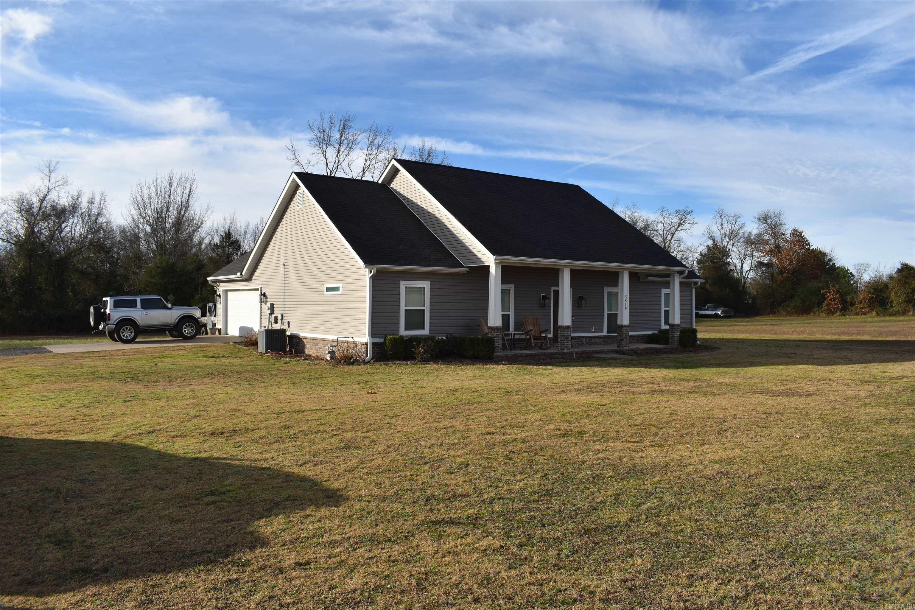 Located just minutes from Alma, this beautifully finished home has many great amenities you’re sure to love. The 1.87-acre lot is spacious, with a large back yard plenty of room for entertaining family and friends. Inside the home you’ll notice the open floor plan in the living area, along with granite counter tops in the kitchen, gas cooktop, double ovens, and a large pantry offering plenty of storage. The split floor plan offers a total of three beds and two baths, with a beautifully designed master suite, complete with a tile walk-in shower. With its quiet location, peaceful neighborhood, convenience and elegance, you will not want to miss this home. Schedule your private showing today.  • 1.87 +/- Acres • 1,660 Square foot home • Two car garage • Three Bed Two Bath • Covered Front and Back Porches • Granite Countertops • Nicely finished master suite • Spacious Yard • End of dead-end road • Minutes from Down town Alma