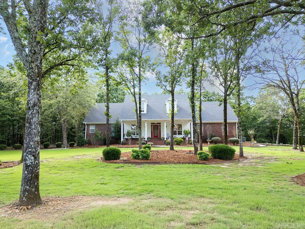 Spacious 4-bedroom, 3-bath home offering 3,354 square feet of living space on approximately one acre is an affordable entry to Cresthaven Subdivision, a quiet, established setting. Built in 2000, this well-maintained home features a timeless brick exterior, welcoming covered front porch, and a beautifully wooded lot providing privacy and natural surroundings. Inside, you’ll find generous room sizes, crown molding, and abundant natural light throughout. The living area features hardwood flooring and a fireplace, creating a comfortable gathering space that flows into the kitchen and dining areas. The kitchen offers ample cabinetry, workspace, and a breakfast area overlooking the backyard. A formal dining room provides additional space for entertaining. The spacious primary suite includes dual vanities, a soaking tub, and separate shower. Additional bedrooms are well-sized with ample closet space. A large bonus room provides flexible space for a media room, office, or recreation area.   With a functional layout, solid construction, and ample square footage, this home is priced to allow the next owner to make personal updates while building equity.  Call to schedule your showing today!