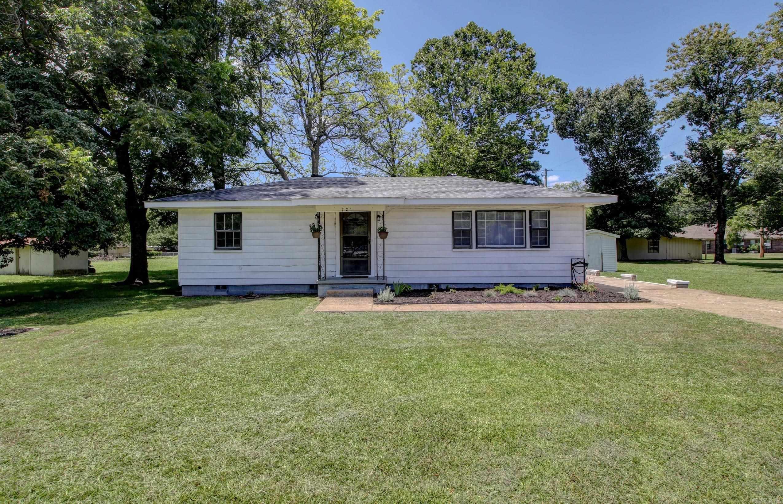 Absolutely ADORABLE & CHARMING 3BR/1BA home with brand new roof installed late June 2024. Stunning hardwood floors w/ LVP in bathroom & laundry room. Cabinets, granite countertops, & appliances new in 2022. NEW HVAC 2025. Vapor Barrier installed 2024 in crawl space. 2 bedrooms will accommodate queen size beds. 2 Exterior storage buildings for all of your outdoor storage needs! Home is PRECIOUS, well maintained, convenient to UCA, CBC & other area amenities! Go see it today! *See agent remarks*