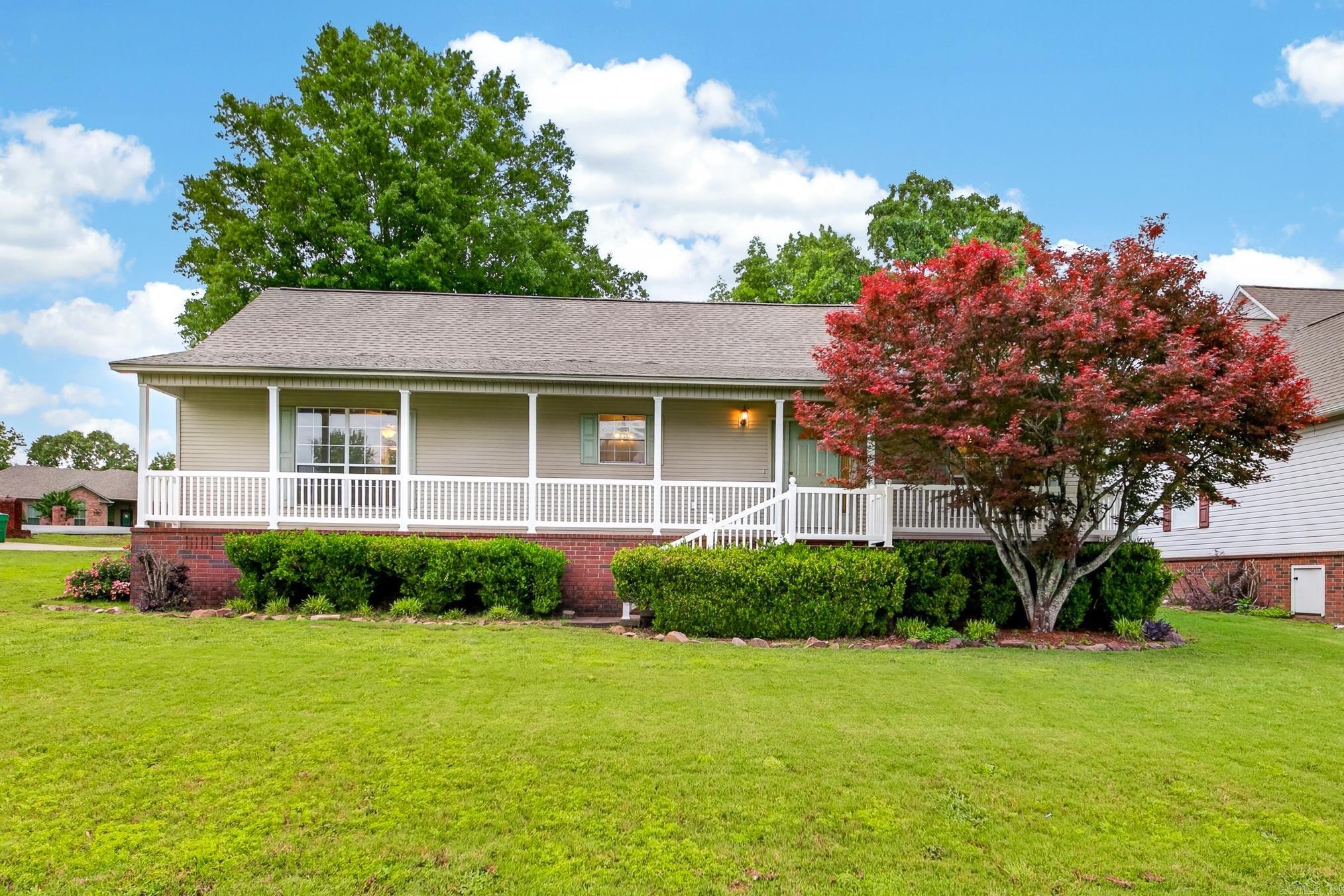 $2500 FLOORING ALLOWANCE INCLUDED IN ACCEPTABLE OFFER! Discover this move-in-ready gem at 50 Morgan in Cabot, AR. Home has fresh paint and the split floor plan offers privacy and open living spaces, with a sunlit, spacious living room featuring large windows. The kitchen boasts ample wood cabinets and a Pellet stove. Outdoors, enjoy a covered pavilion perfect for cooking and entertaining. Hardwood floors add warmth and sophistication throughout. Make this charming home your sanctuary—schedule a viewing today!
