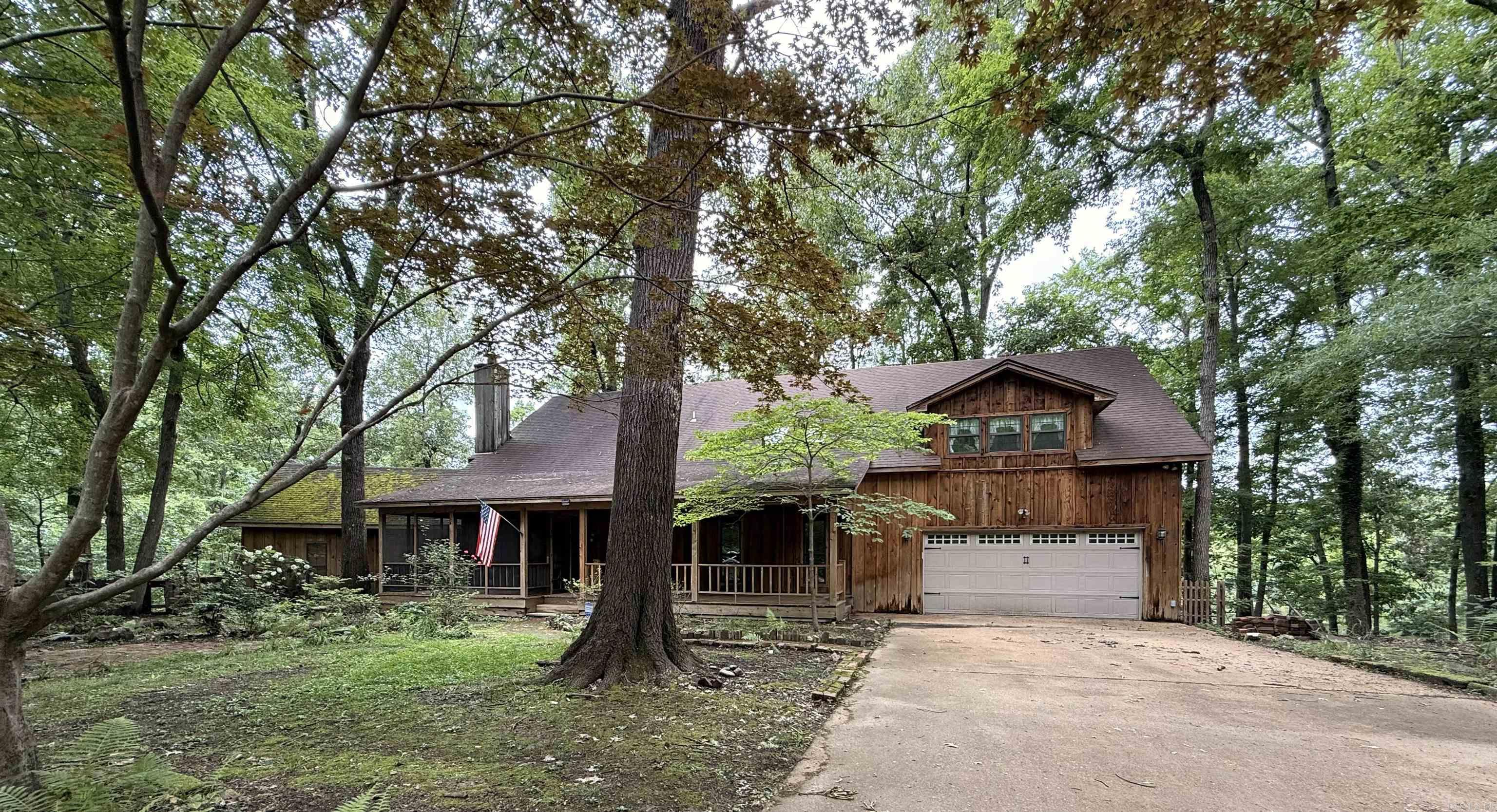 Beautiful lakeside retreat offering wonderful living space inside and out! Enjoy relaxing or entertaining on the large outdoor deck overlooking the water, complete with your own private dock. This property also features an enormous storage building, perfect for boats, tools, or hobby space. Inside, you’ll find a spacious kitchen with abundant cabinetry, a large dining room highlighted by a cozy wood-burning fireplace, and a dedicated craft room ideal for projects or a home office. With 4 bedrooms and 4 bathrooms, this home provides plenty of room for family and guests, while the gigantic closets offer exceptional storage throughout.