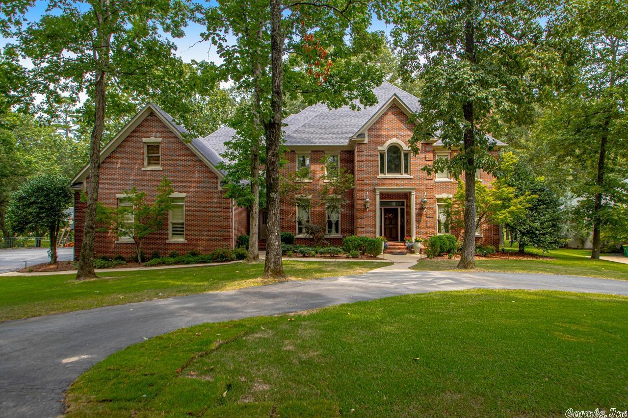 Gorgeous golf course home in the gated "Estates" in Chenal.  Large flat 1 acre lot with incredible views.  Gourmet kitchen with high end appliances open to the large family room. In addition to a formal dining room and a front living room, there is a private guest bedroom and full bath with walk in shower perfect for guests! Enjoy the "family" entrance which leads to the back staircase and mudroom. Immaculate condition with tons of updates.  Upstairs features a wonderful media room as well as a laundry room.  All bedrooms are large.  See Documents for a list of updates.