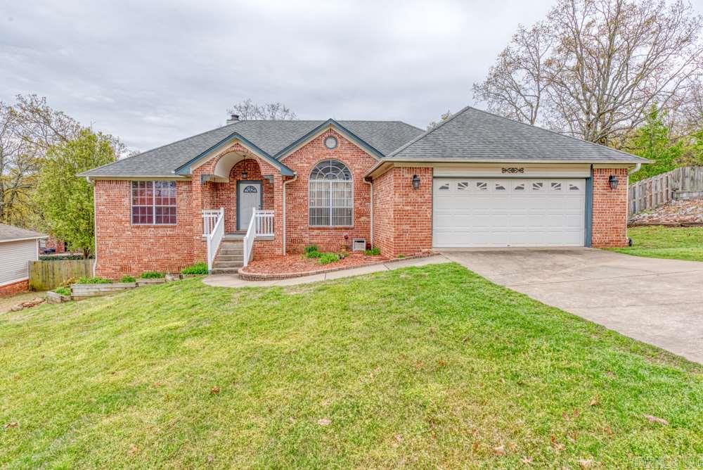 Great floorplan for this 3 BR, 2 bath home featuring large greatroom with FP, formal dining room, eat-in kitchen and laundry room with sink.  Master is nice size with walk-in closet, double vanity, tub and separate shower.  Kitchen has stainless steel appliances, plenty of cabinets and an island.  Double layer deck, under house storage.  House needs some TLC but will make a great home & the location is great.  Deck needs some work. House sold As Is. Agents see remarks