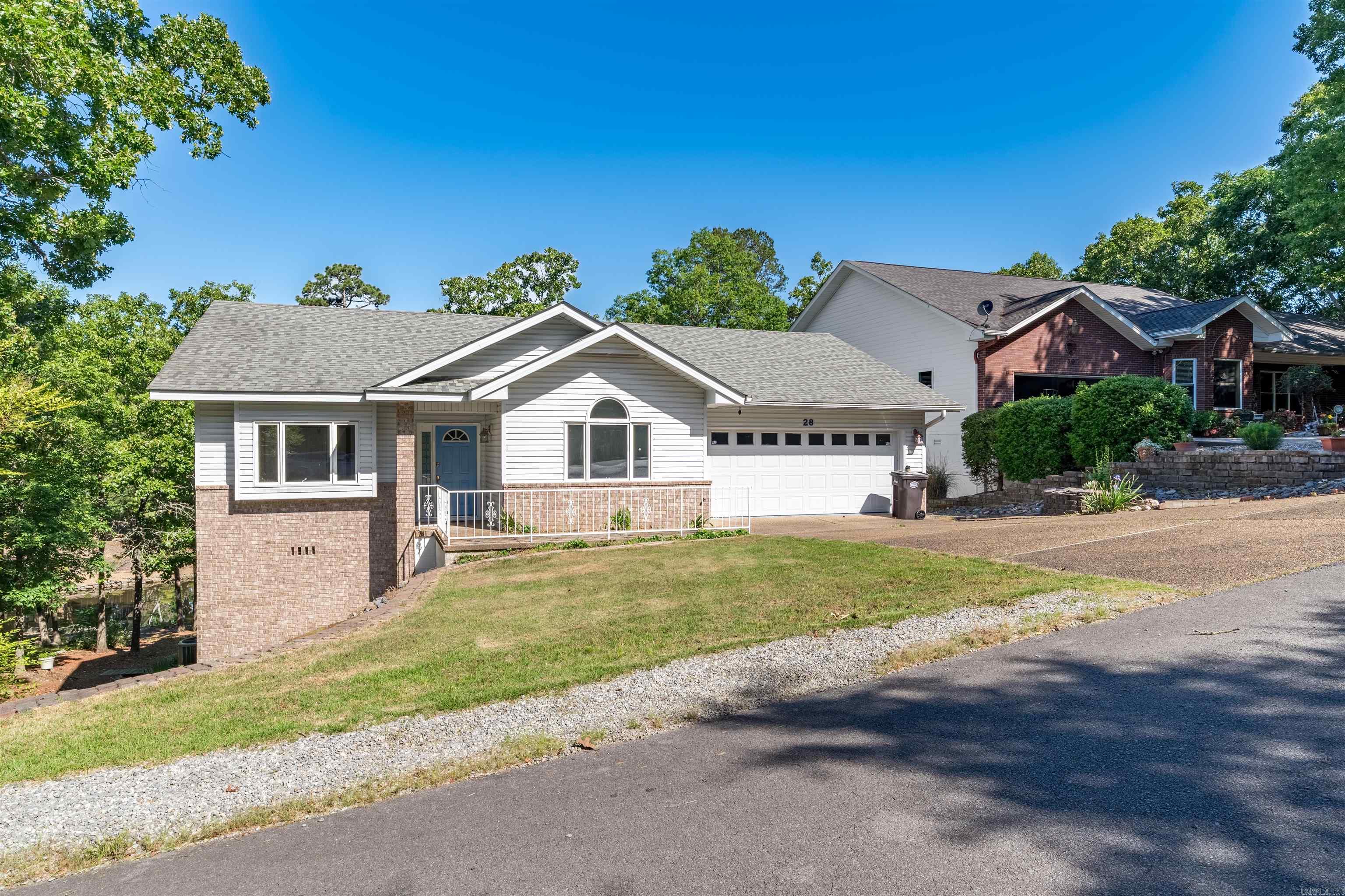 Fantastic water view!  Split floor plan. Heat pump 2024. Architectural Roof 2016.  Generac generator. Peachtree casement windows. Covered deck. Hot tub. Master bedroom with 2 closets. No seller disclosure
