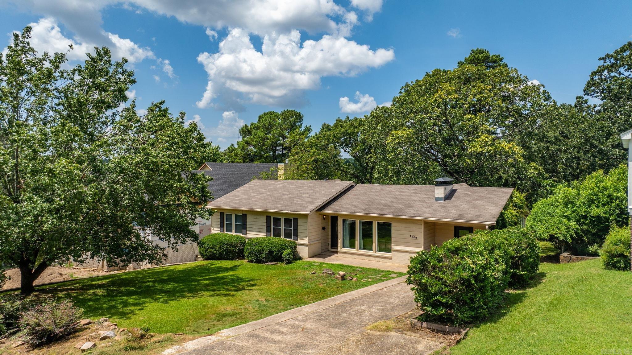 Price To Sell!  Seller Also Offering $5,000 In Seller Credits With Acceptable Offer!  Located in Kingwood Place subdivision, this well-maintained 3-bedroom, 2-bathroom home features an open-concept layout with hardwood floors throughout. All bedrooms are located upstairs, while the large bonus room downstairs offers flexible space for a media room, home office, additional bedroom, or extra storage.  Enjoy two screened-in porches—one off the dining room and the other off the primary suite—both overlooking mature trees and providing perfect spots to relax and unwind. The home also includes a spacious laundry room and a bright, open kitchen and living area that’s ideal for entertaining.  Don’t miss this opportunity to make this place your home—schedule your showing today!