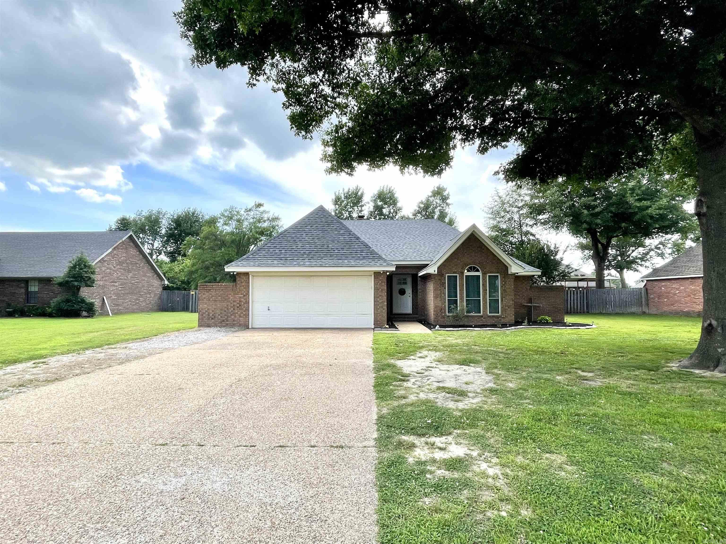 This all brick home located at 300 N Willow in Trumann, Arkansas offers everything you need. Offering 3 bedrooms, 2 bathrooms, 2 car garage and a fenced backyard, with gas heat and gas water heater. The HVAC unit and water heater were replaced in 2022 by the previous owner. Current owner replaced the roof with architectural shingles in 2024 and also recently painted the interior prior to listing. This home is low maintenance with the big items already taken care of for you. Located within short walking distance to the Trumann Elementary School and Trumann High School. Just a short 15 minute drive to Jonesboro and 45 minutes to Memphis. Call your favorite REALTOR® and schedule your private tour!