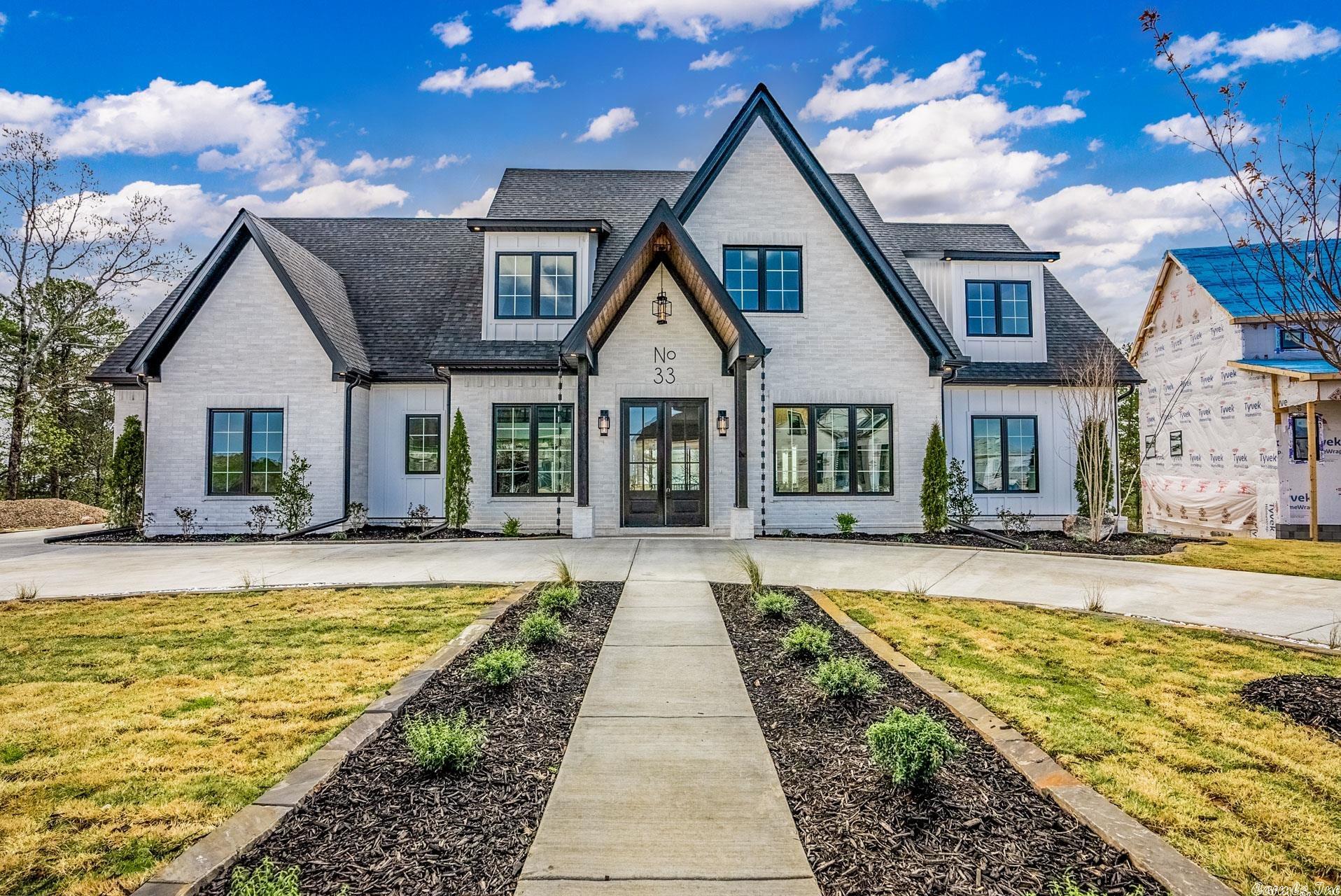 Walk up to your grand entrance with flawless landscape, and take awe of the BEAUTIFUL views. This homes craftsmanship is BAR NONE! The extraordinary build with 5 beds, 3 and 1/2 baths, and boasts of 4620 sq ft. The attention of detail makes the modern finishes feel homey. Enjoy an open floorplan and an oversized deck. The master bedroom& bath are the perfect, step out of a magazine touch! Your children or grandchildren will get to enjoy a flat lot as it was built up just for that. Welcome home to perfection