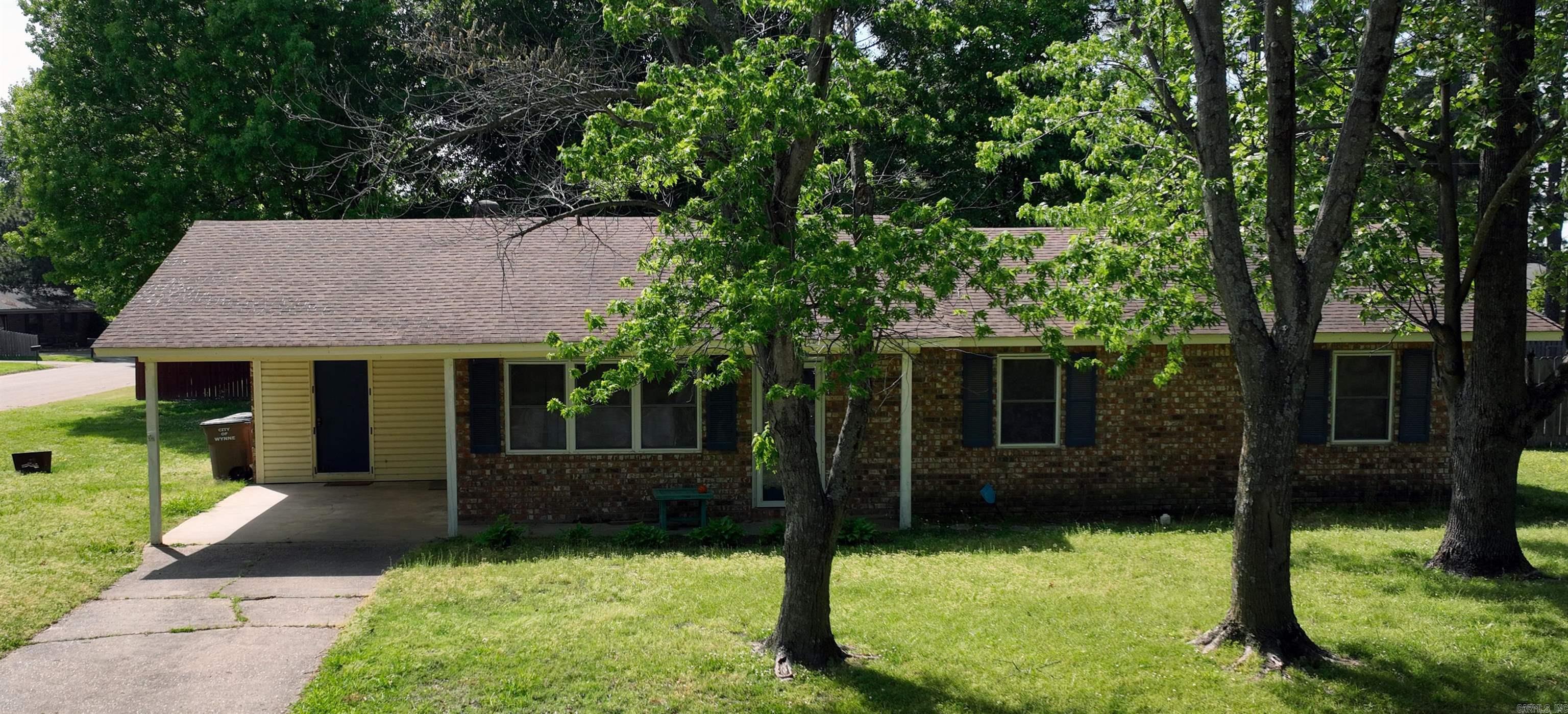 Priced at $164,999, this 1,744 sq. ft. 3-bedroom, 2-bath home at 1803 Ouida Street is located in a well-established neighborhood and offers a functional layout with versatile living spaces. The home features a comfortable living room with a gas fireplace, as well as a separate den that can easily serve as a game room, office, or second living area.  Situated on a large corner lot, the property includes a partially fenced backyard, providing space for outdoor activities or pets. An office area located just off the carport adds convenience for work or hobbies, while a spacious storage building in the backyard offers additional room for tools and equipment. A separate parking pad provides extra parking options, making this home both practical and accommodating.