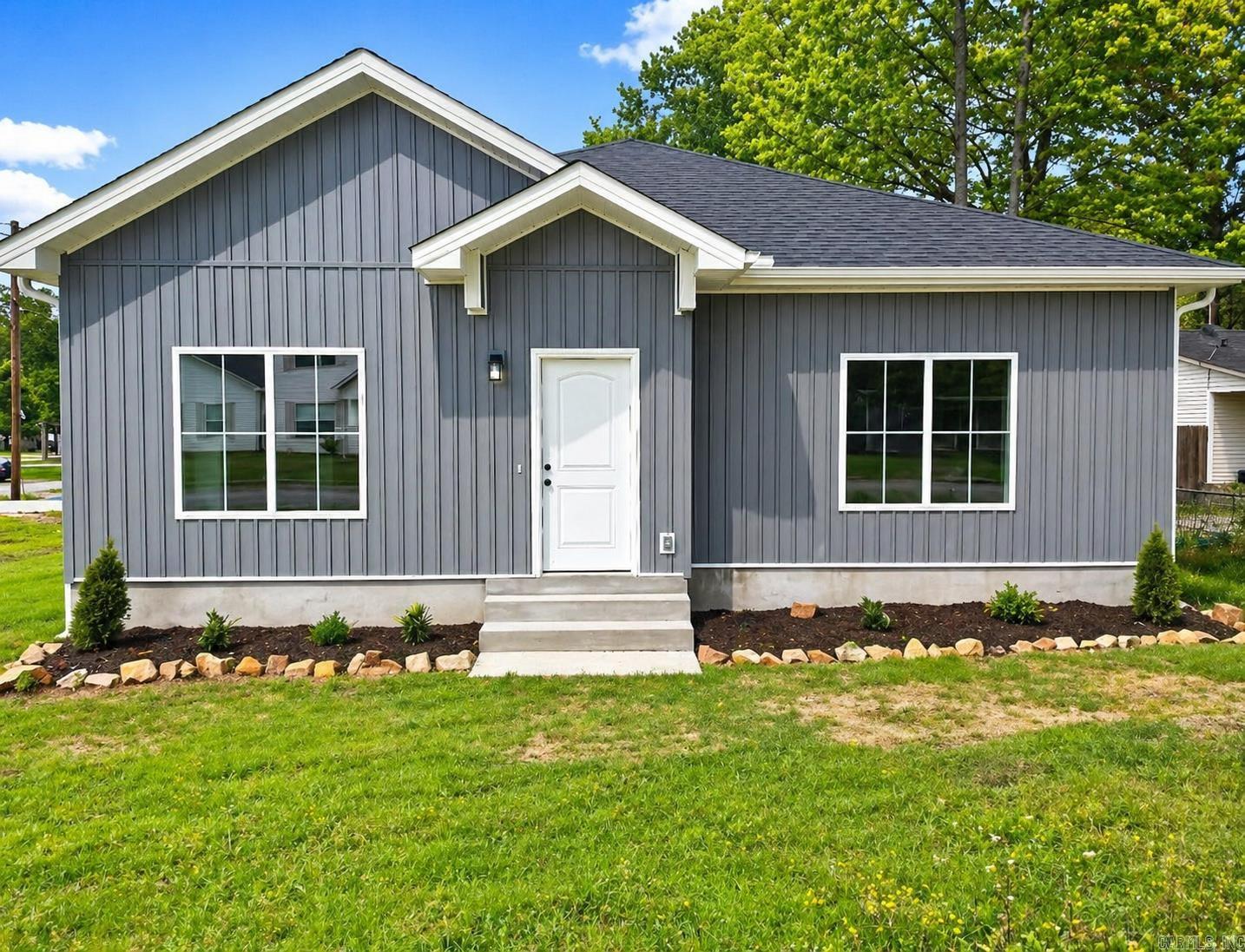 Come and tour this 3 bd. 2 ba. Brand new construction home with an open floorplan. It has soaring ceilings, granite countertops, luxury vinyl flooring, custom cabinets, and more! The tall windows gives a more bright modern look with beautiful lighting. It features a oversized laundry room, spacious bedrooms, and custom closets. You'll love the unique fixtures throughout the home. You'll just love the gorgeous heat producing LED fireplace. It sits on the corner with a oversized lot for plenty of space for entertaining family and summer bbq's. The neighborhood is peaceful and quiet and it's only a couple of minutes from Heritage Park and has easy access to the highway. This home is move-in ready. Call or text listing agent today to take a tour. Don't miss this opportunity! It won't last long!  A few photos are enhanced with AI for better lighting.