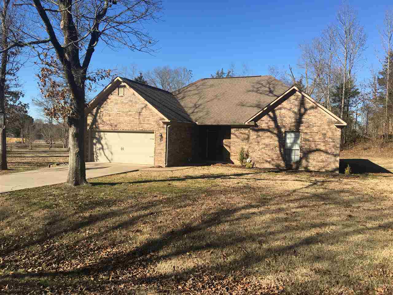 Close to town and Hwy 65 and yet you feel like you are in the country. The great room has many pluses with a vaulted ceiling, corner fireplace and hardwood floors. Carpet in the 4 bedrooms and ceramic tile in the bathrooms. The open kitchen has a wall of cabinets with plenty of counter space.  Dining area adjacent to kitchen with a view of the fireplace! Master bedroom has box ceiling and an updated bath with a newly-tiled walk-in shower.