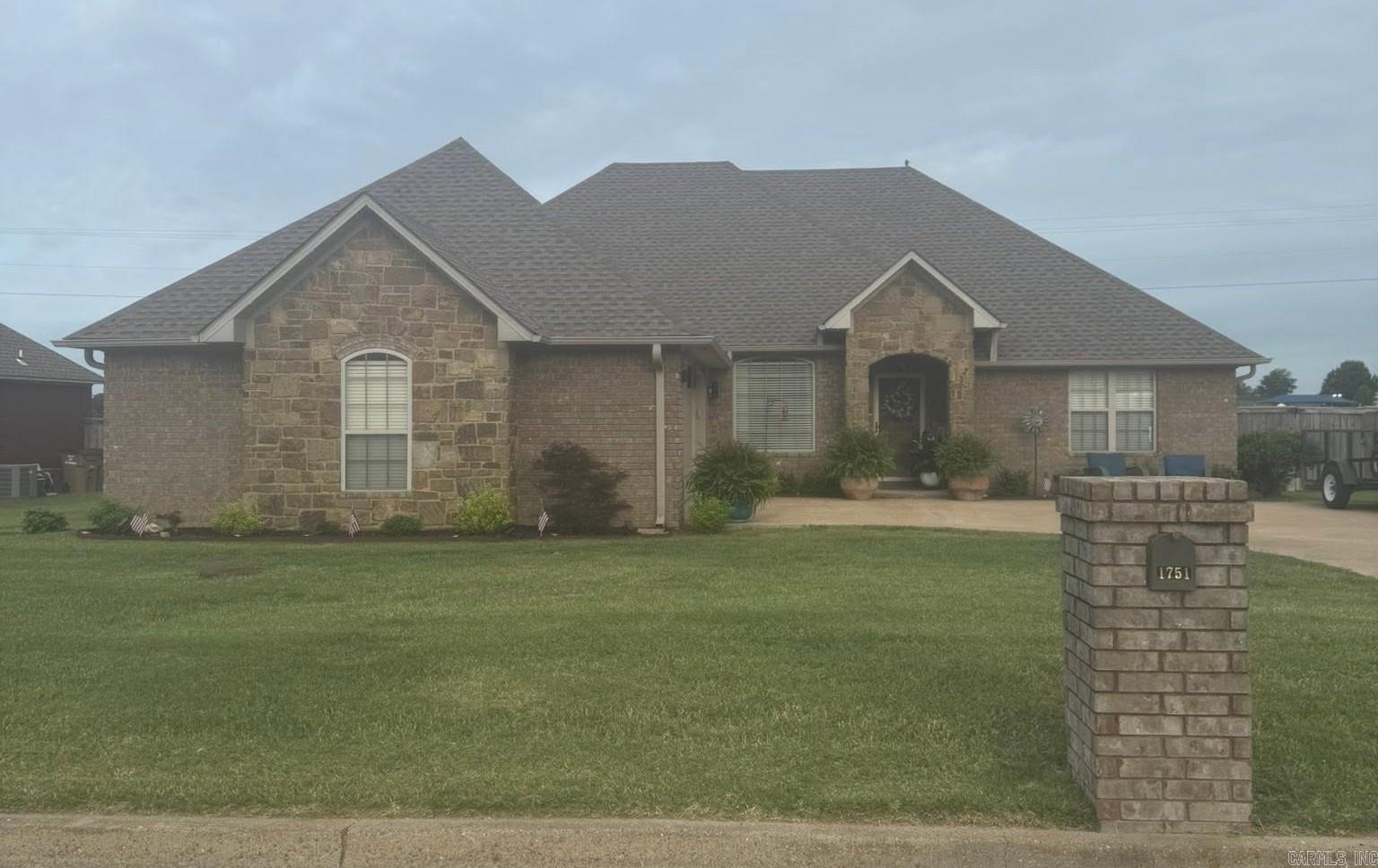 Welcome to beautiful Fox Crossing Subdivision! This gorgeous 3-bedroom, 2-bath home has been tastefully updated and is completely move-in ready. A side-entry garage adds privacy and enhances the home's curb appeal. Inside, you'll love the spacious open floor plan featuring vaulted ceilings, a formal dining area, and a large breakfast room that creates the perfect space for everyday living and entertaining. The oversized primary suite easily accommodates a sitting area and includes a private bath with a soaking tub, separate shower, double vanity, and a generous walk-in closet. Two additional guest bedrooms and a well-appointed guest bath provide plenty of space for family or visitors. Recent updates include beautiful new flooring, fresh paint, updated fixtures, countertops, appliances, and more, giving the home a fresh, modern feel throughout. Step outside to enjoy the private, fenced backyard—perfect for relaxing, pets, or entertaining. Homes this updated in Fox Crossing don't last long. Schedule your private showing today!
