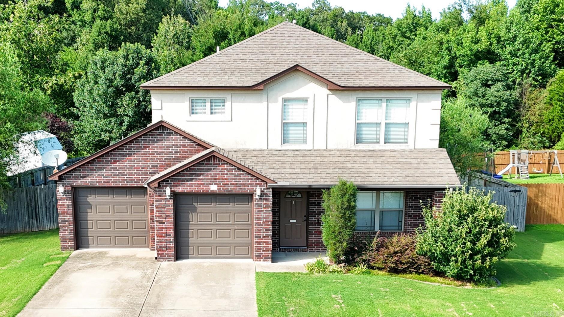 Welcome to this cozy 2 story home is located in the desirable subdivision of Southern Comfort Estates. This spacious 3-bedroom, 2.5-bath residence features a spacious living room, a modern kitchen equipped with all stainless-steel appliances, beautiful hardwood floors, and much more. Enjoy the large backyard backing up to woods, providing added privacy and a peaceful setting. Updated bathrooms and walk-in closets enhance the comfort and convenience throughout the home. The attached two-car garage offers ample space for vehicles and extra storage. Perfectly situated just minutes from Cabot Junior High South, Neighborhood Market, and the Cabot Community Pond.