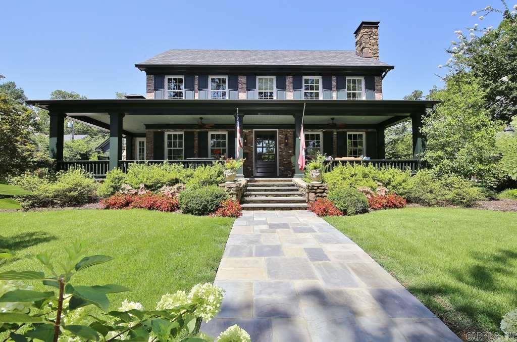 Wonderfully warm family completely (to the studs) remodeled from 2011.  Everything brand new in 2011.  Custom everything with 5 bedrooms, four full baths, 1 half bath in main house.  2 car garage with full bedroom & bath above which connected to the house.  Extensive parking holds up to nine cars in the parking area.  Huge landscaped, fantastic lot.  Huge wrap around porch.