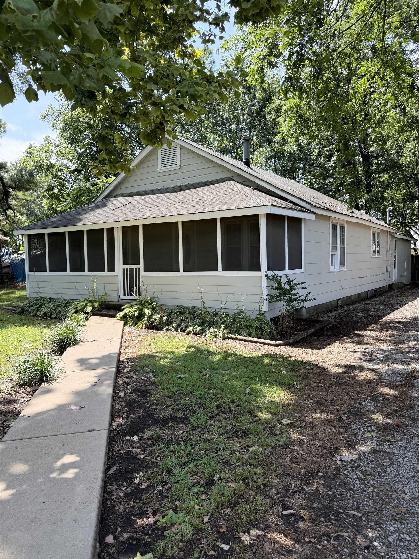 This charming home sits in the heart of Pollard, AR! Featuring a bright and inviting sunroom that's perfect for relaxation, this home offers plenty of natural light throughout. The cozy living spaces provide the perfect blend of character and functionality, while the sunroom creates an ideal spot to enjoy the outdoors from the comfort of your home! Whether you're looking for your first home, a place to downsize, or a peaceful retreat, this home is ready to welcome you!