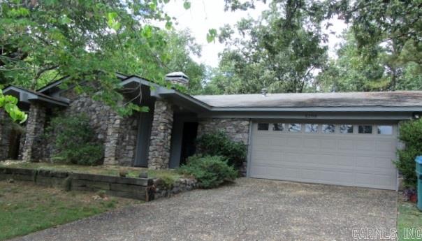Great open floor plan.  Large back sun room.  Roof replaced two years ago.  New stone retaining walls.