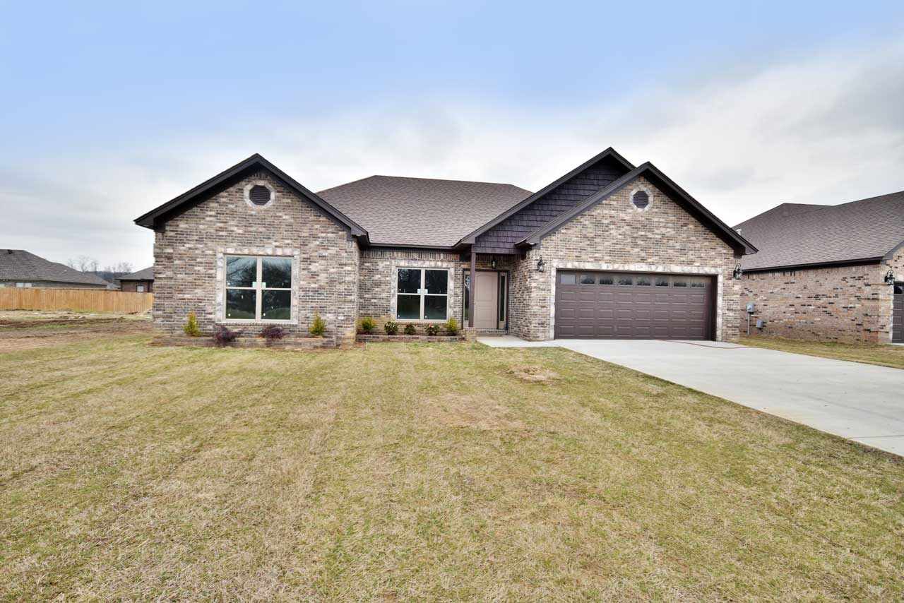This house has all the bells and whistles, large tile walk- in shower  master bath, double vanities in both baths, pocket doors, covered patio, gas cooktop, pantry, granite vanity and kitchen cabinet tops. E level windows,nine foot ceilings throughout  and so much more,  too much to mention
